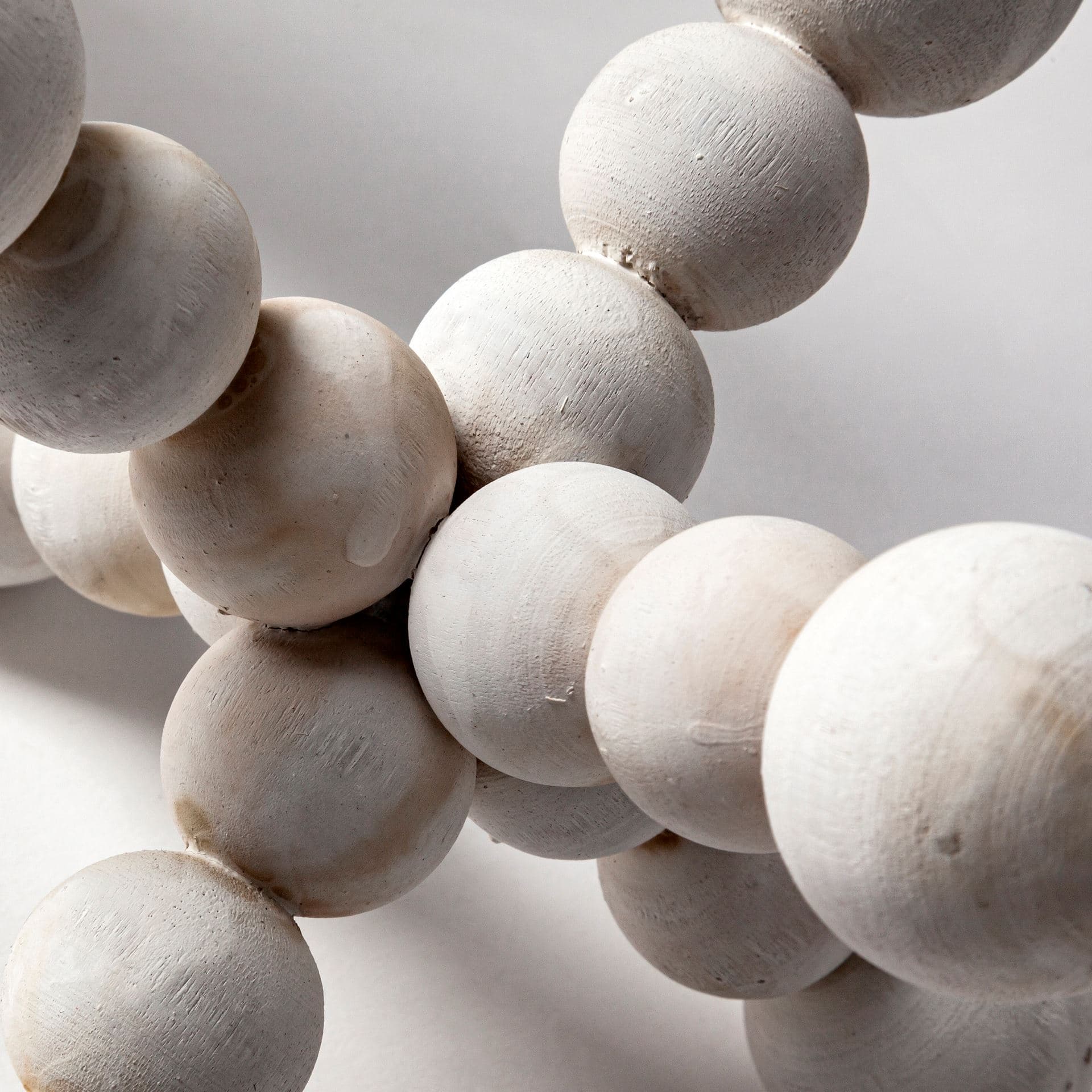 Carrollton I (Small) 7L x 7W Off-White Geometric Wood Ball Jack — product photograph