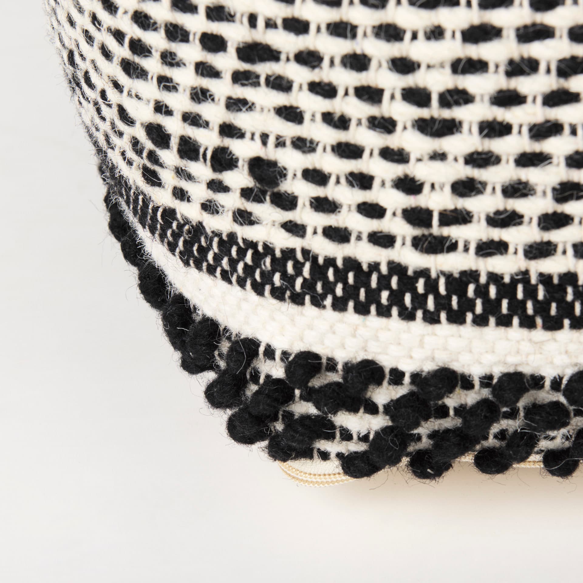 Garima 22.0L x 22.0W x 14.0H Black/White Wool and Cotton Patterned Pouf — product photograph