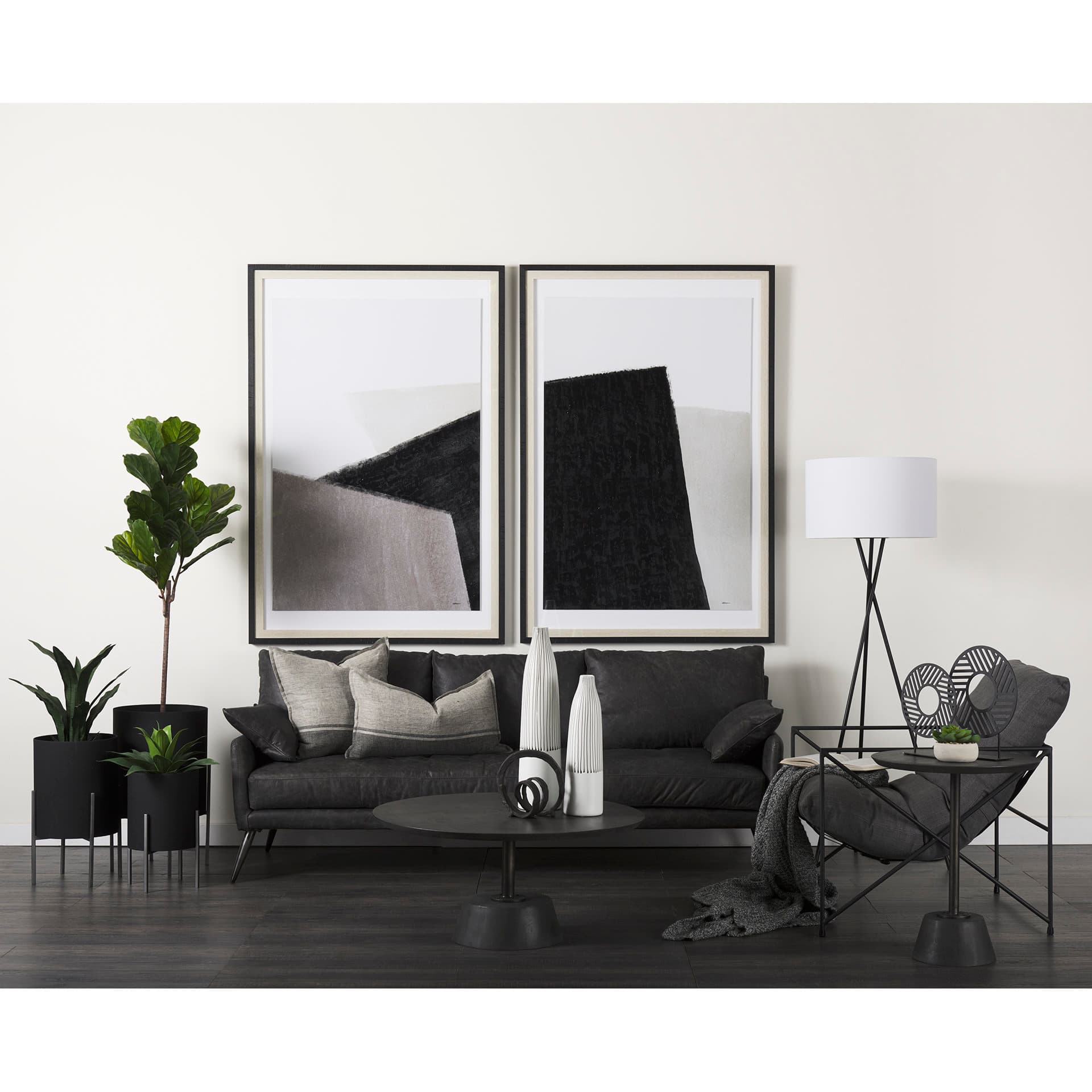 Cochrane 82L x 33W x 32.3 Black Leather Three Seater Sofa — in a styled room