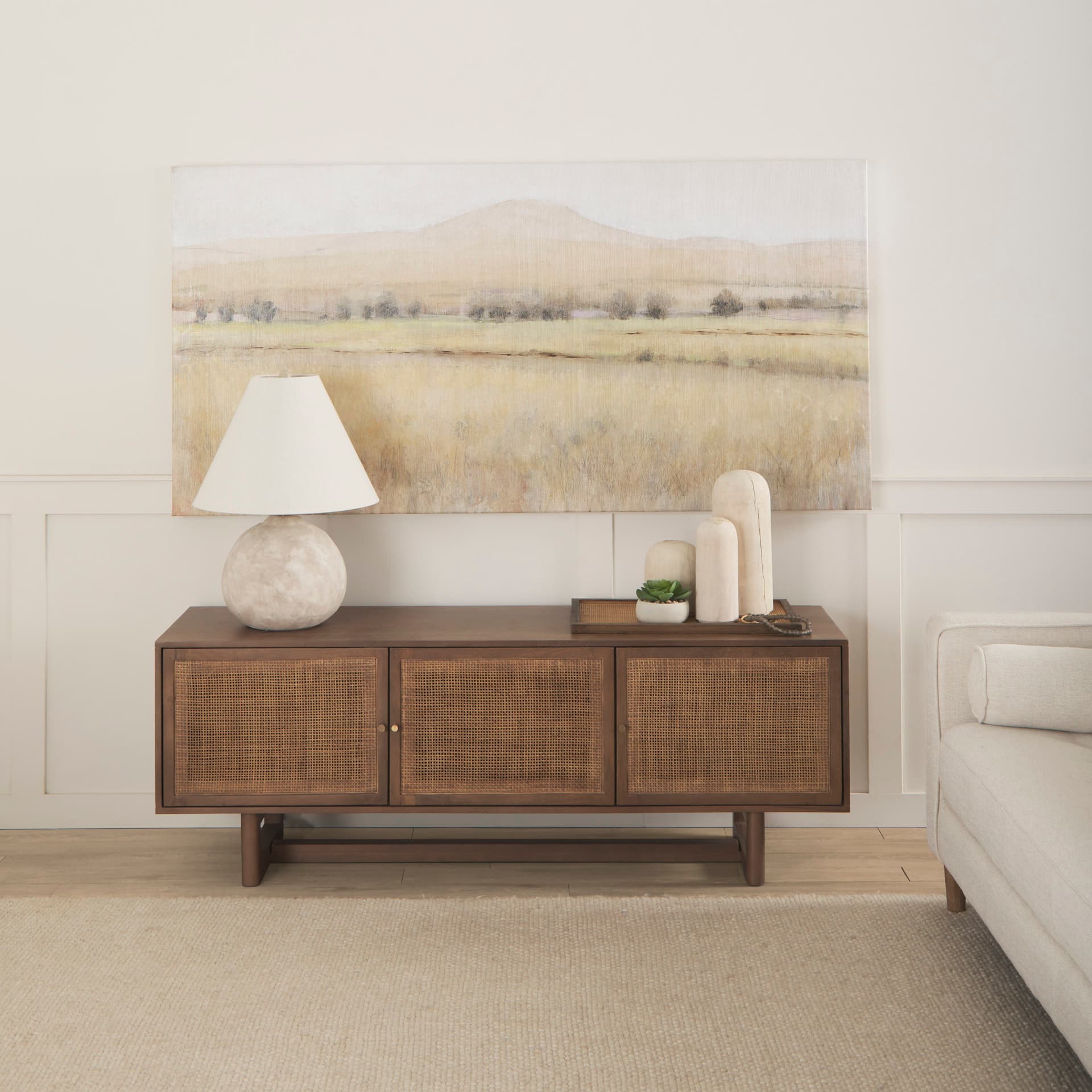 Grier 65" Medium Brown Wood W/ Cane Media Console — product photograph