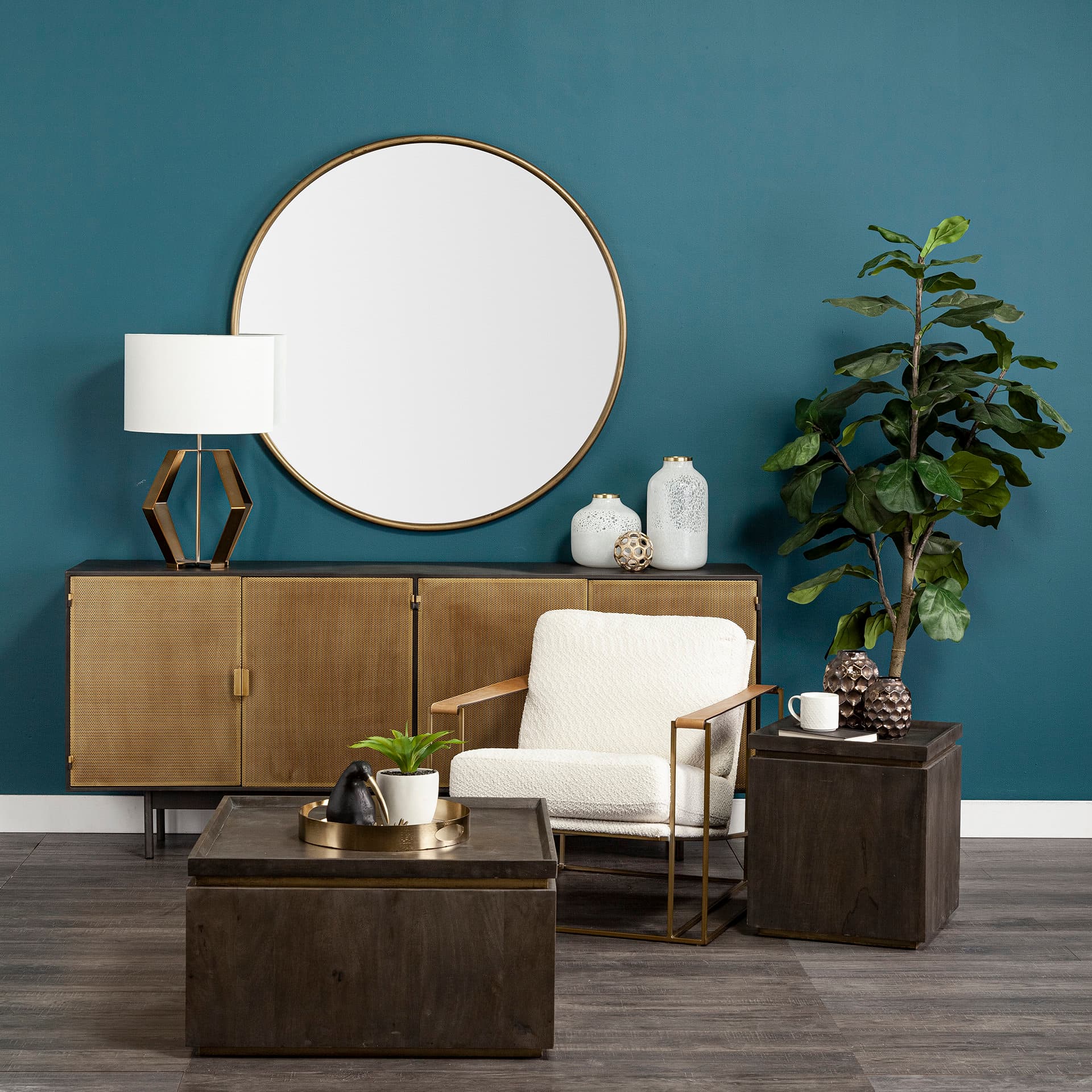Moyer I (Small) 3L x 3W Gold Metal Hollow Decorative Orb — in a styled room