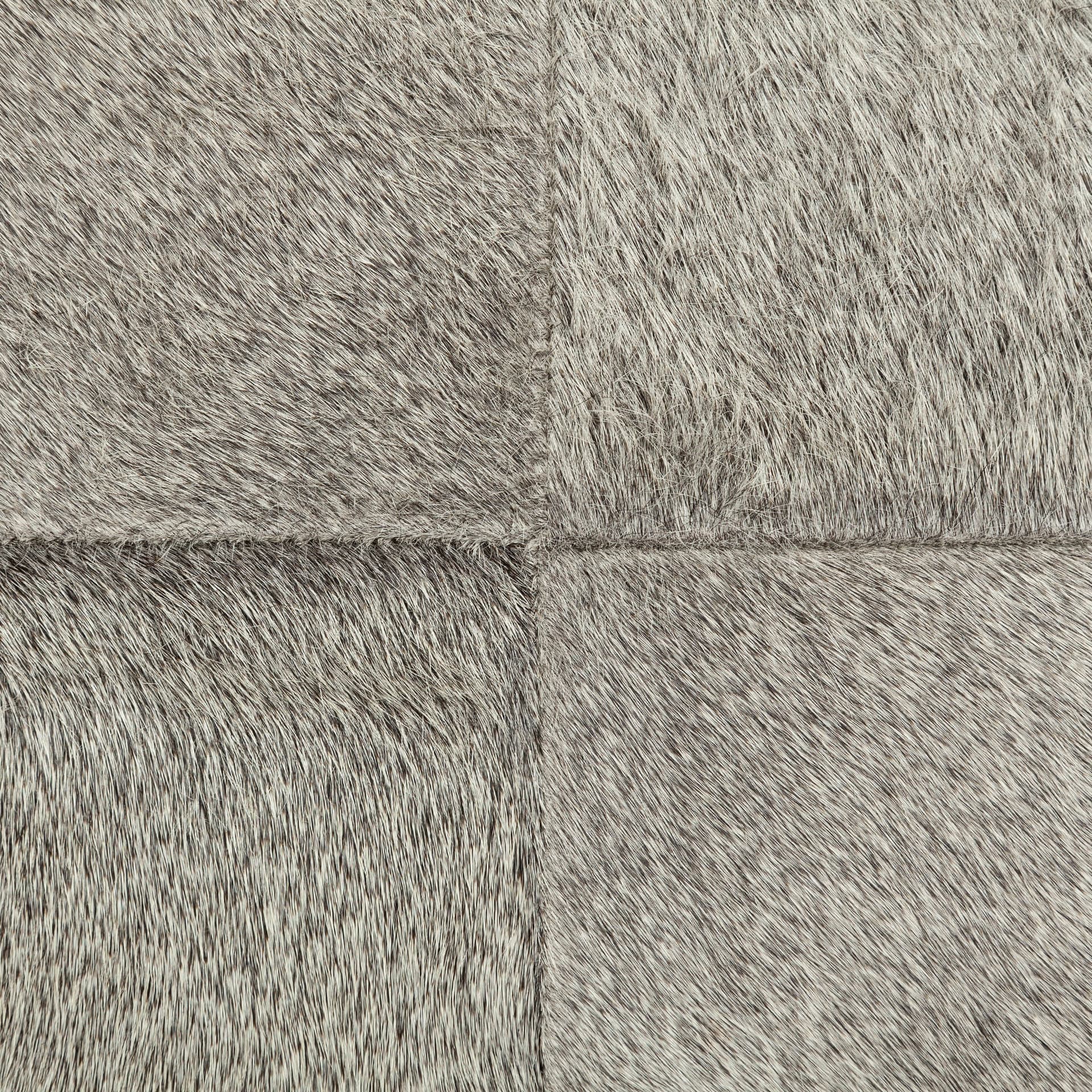 Zahavi I 20" Grey-toned hair-on-hide ottoman — product photograph