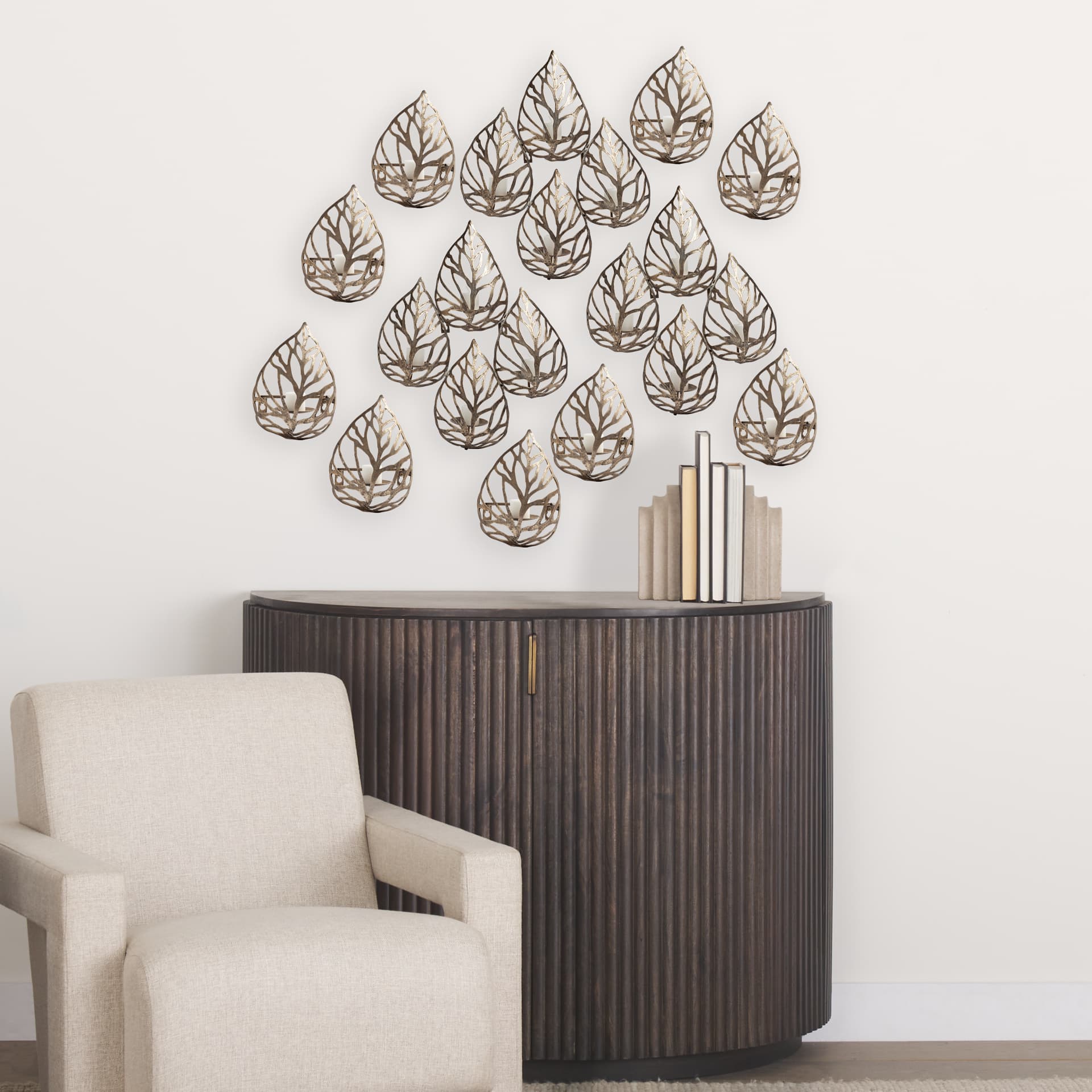 Lana I Single Champagne Toned Wall Candle Holder — in a styled room