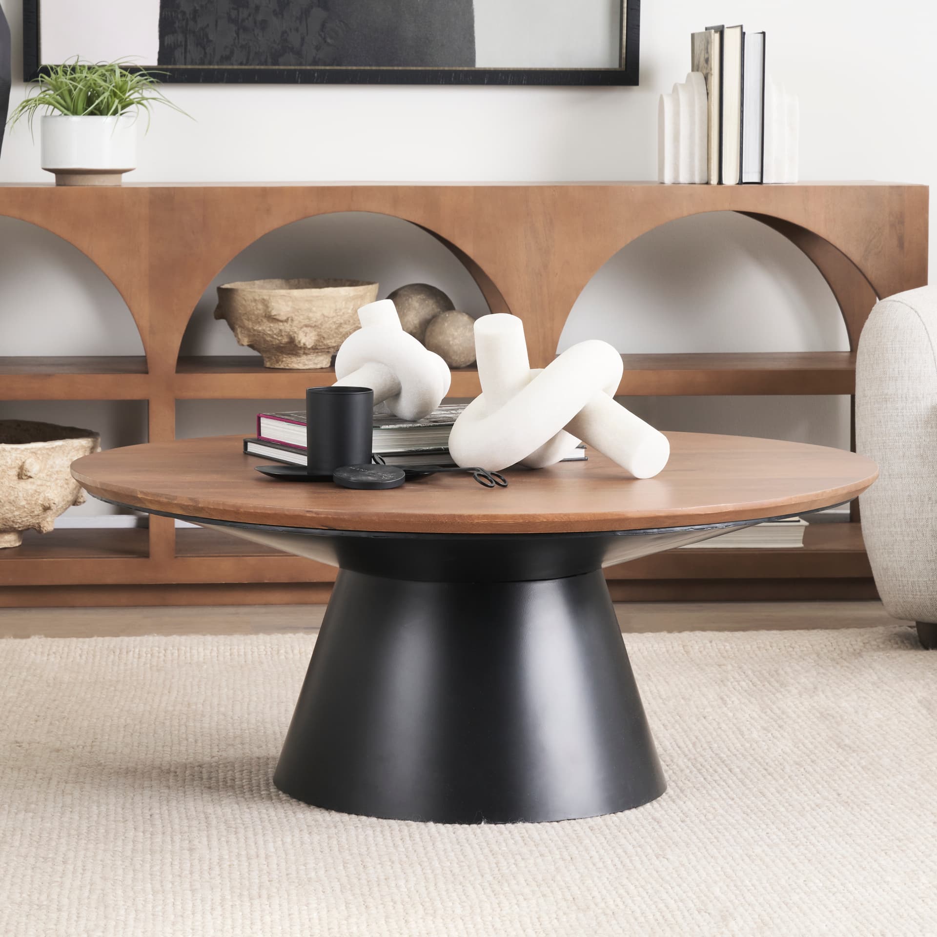 Mitchell 40.0L x 40.0W x 16.0H Black Metal Pedestal Base with Brown Wood Top Coffee Table — product photograph