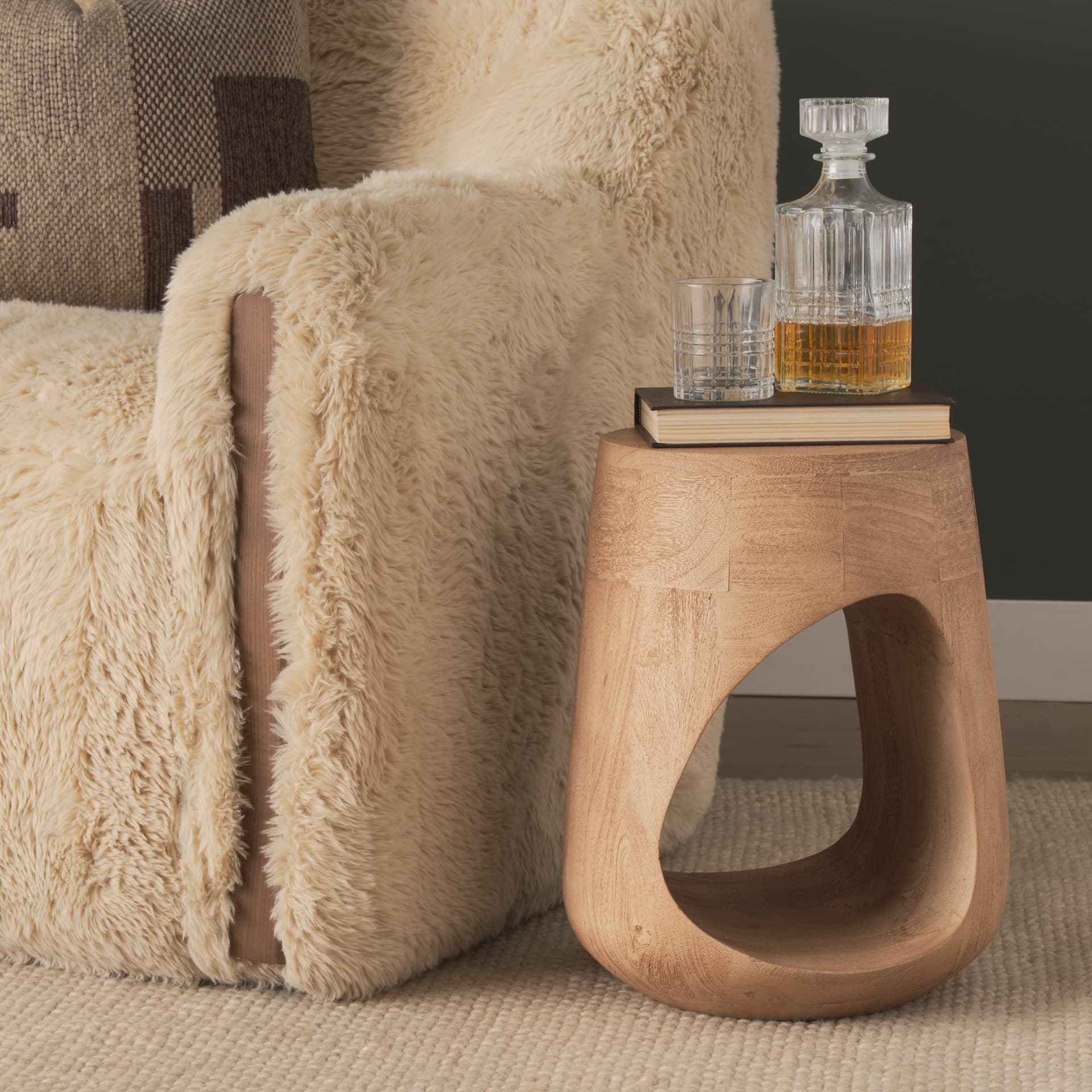 Cove Light Brown Sculptural Open Side Table — in a styled room