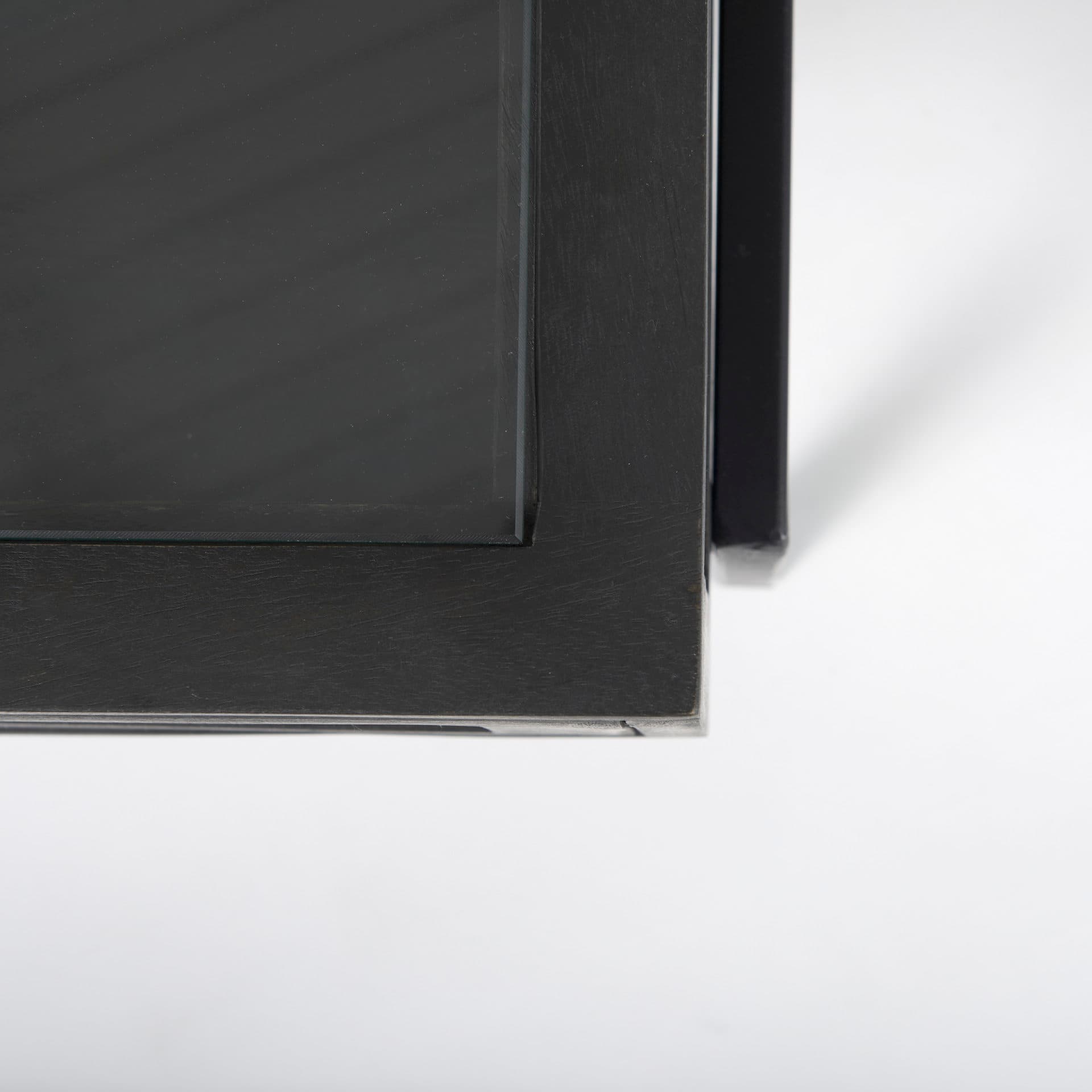 Arelius 49.5"L Rectangular Glass-Top Black-Brown Wood w/ Black Metal Base Display Coffee Table — product photograph