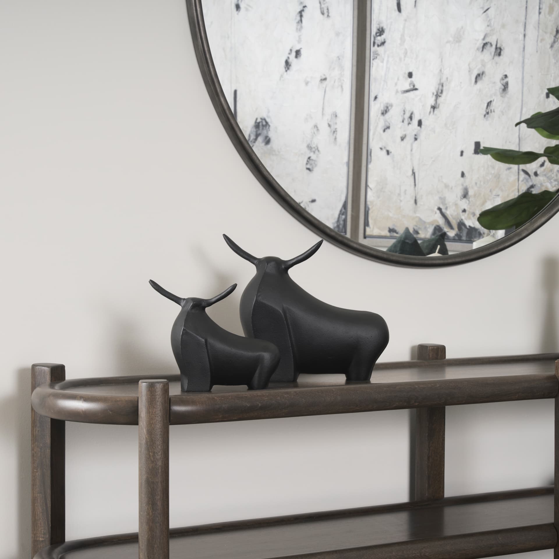 Radu Large Matte Black Metal Bull Decorative Object — in a styled room