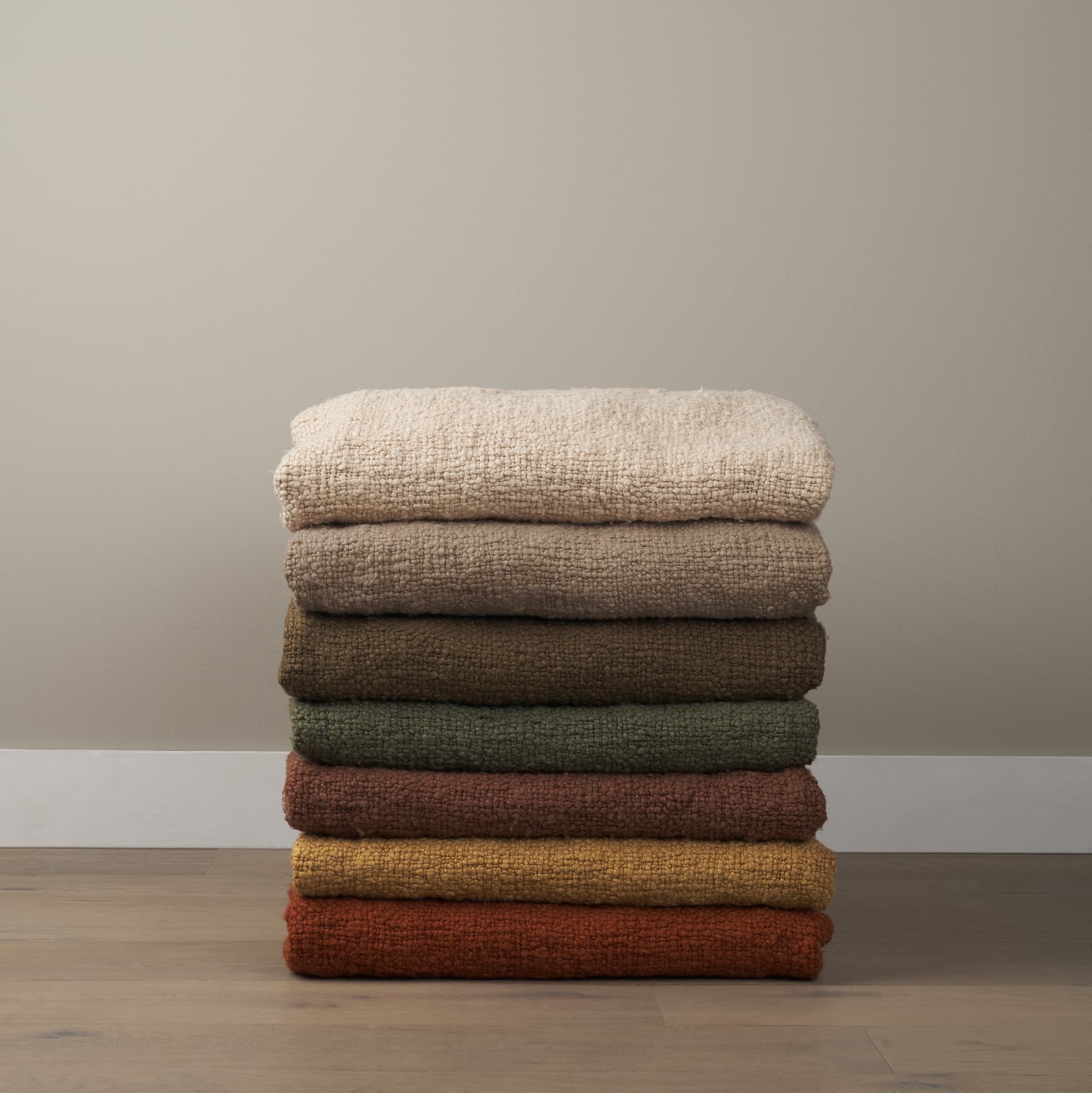 Kambal Light Beige Woven Cotton Throw Blanket — in a styled room