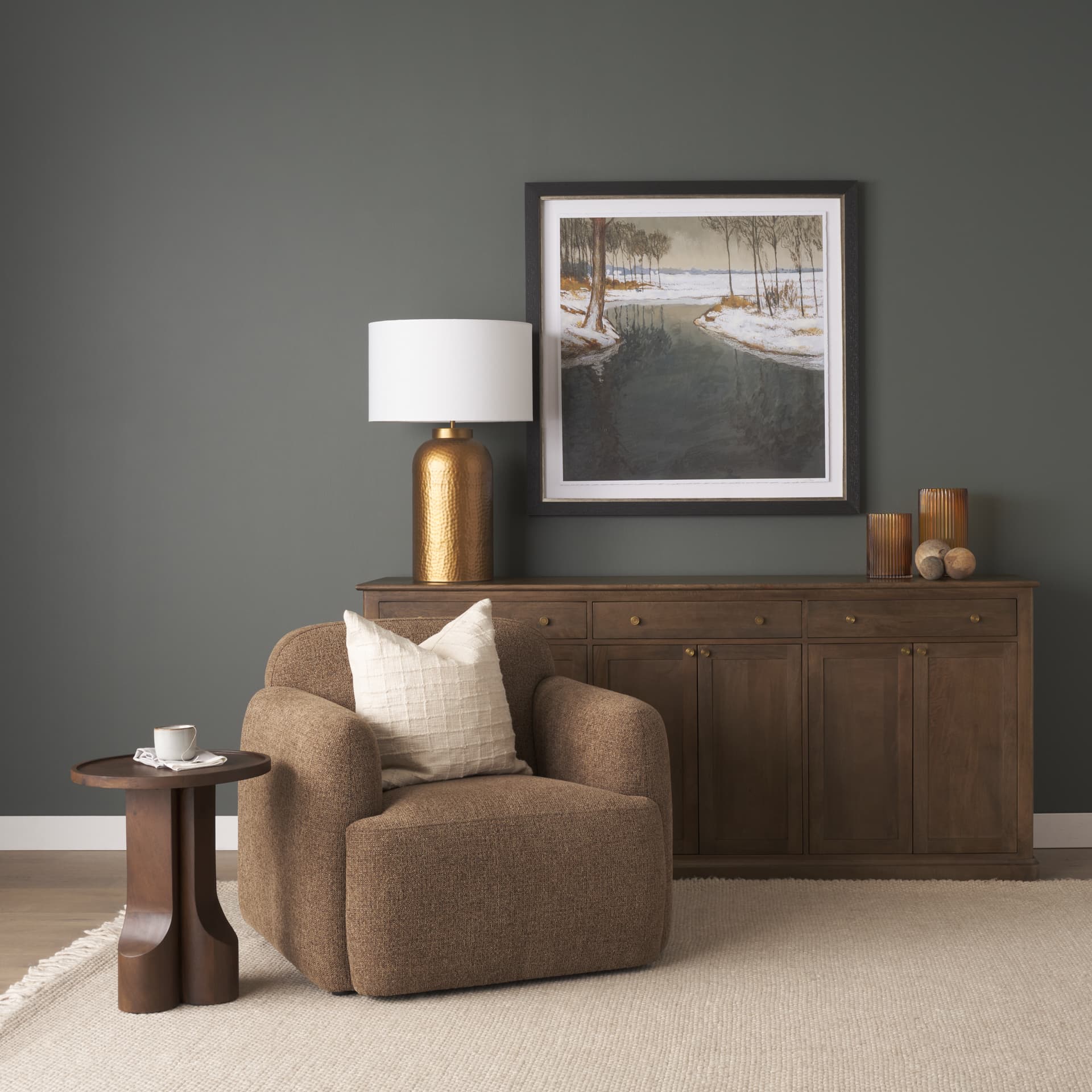 Cayson Dark Brown Sculptural Round Accent Table — product photograph