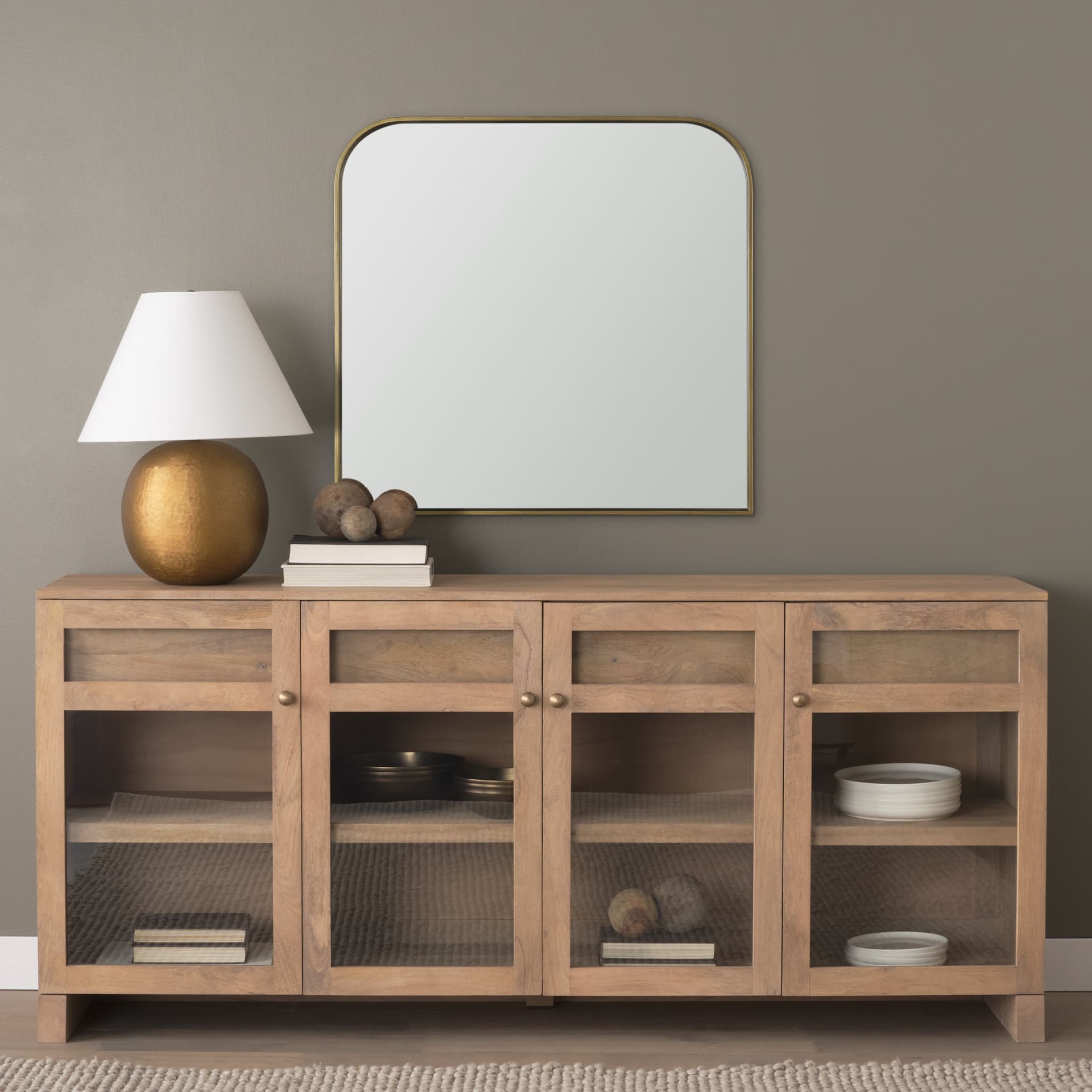 Timon Brushed Gold Square Arched Mirror — in a styled room