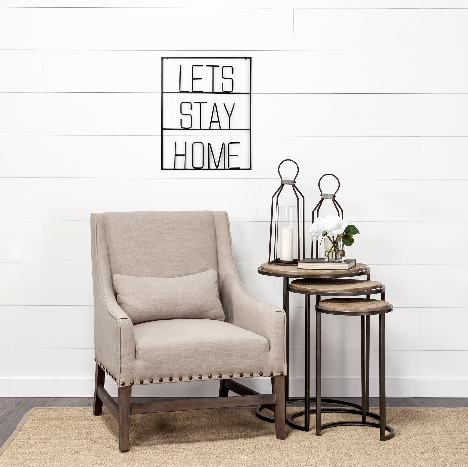 Let's Stay Home Sign — in a styled room