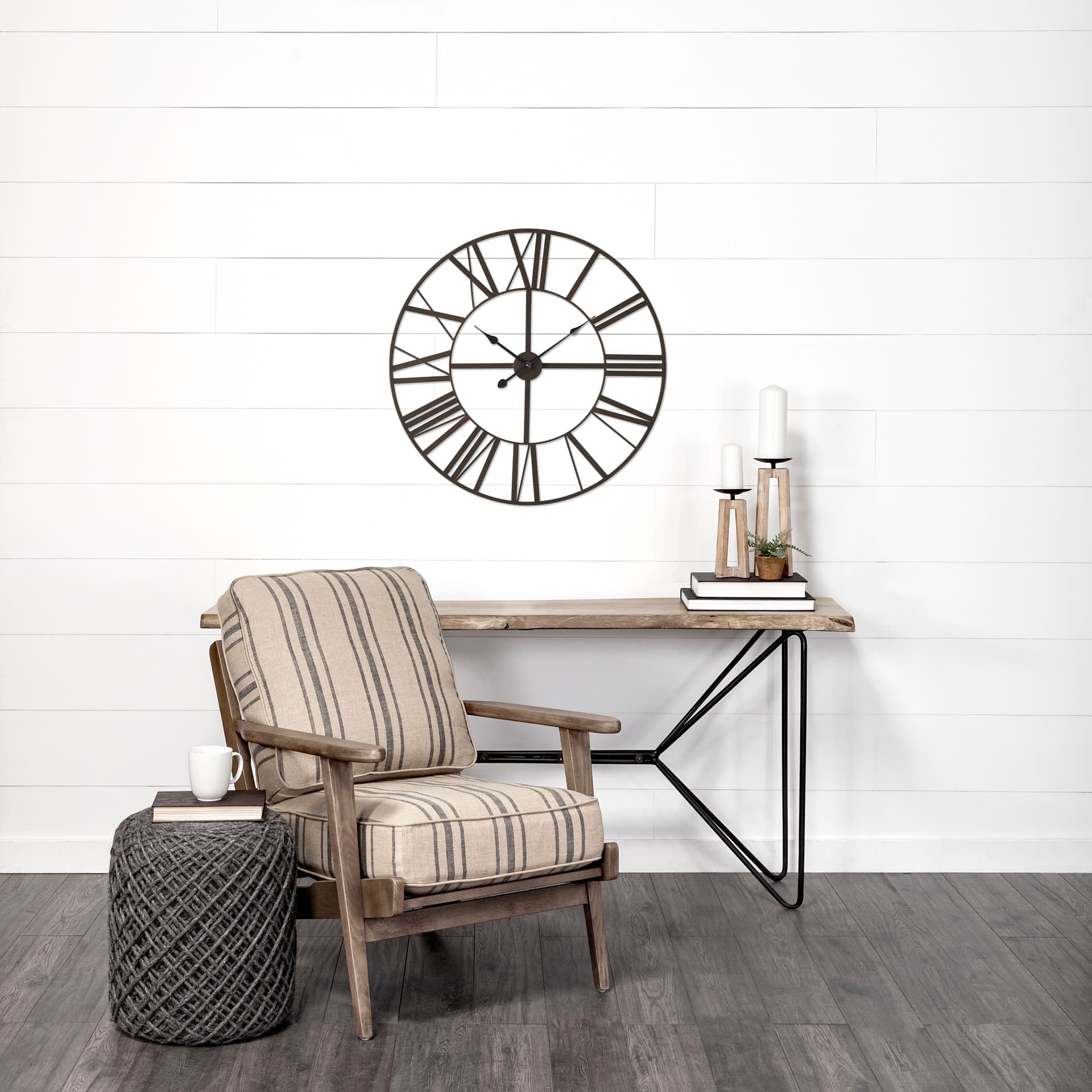 Pender 29.9L x 1.8W x 29.9H Black Iron Round Wall Clock — in a styled room