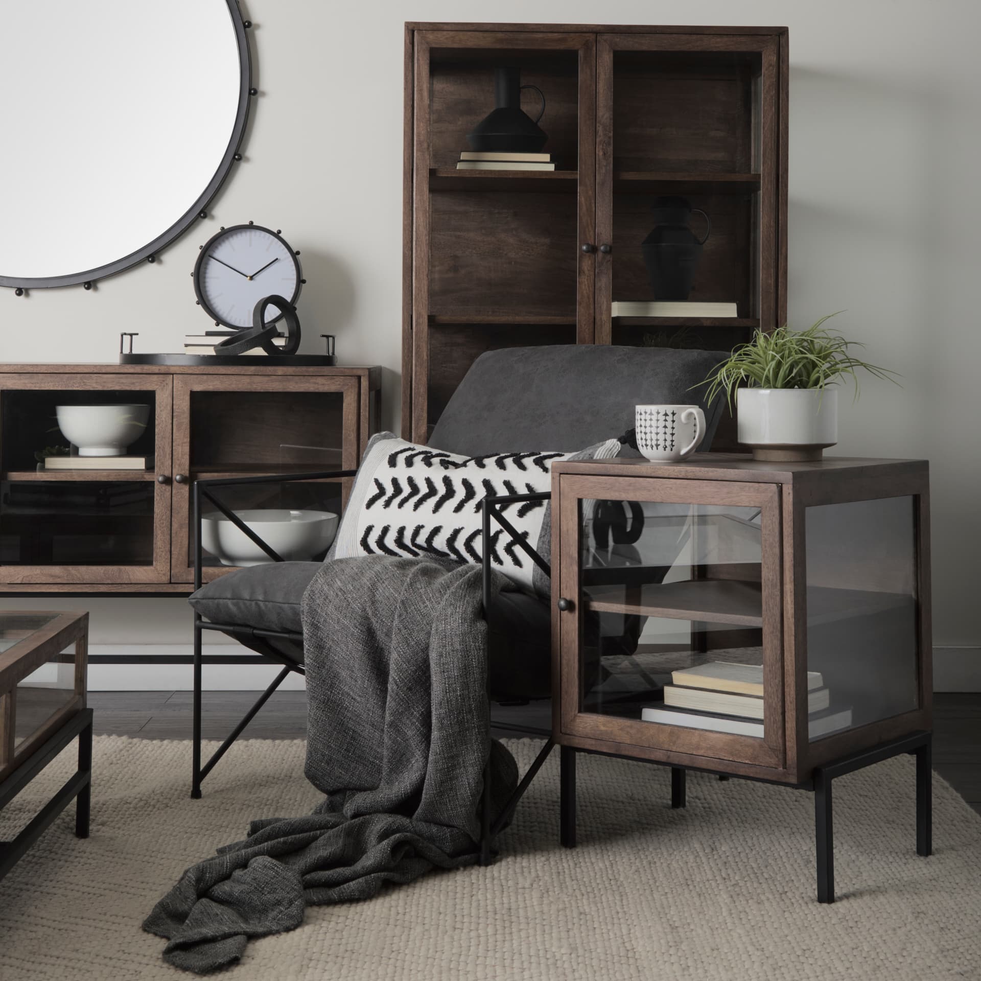 Arelius 36L x 18.75W x 63H Medium Brown Wood W/ Black Metal Base Display Cabinet — product photograph