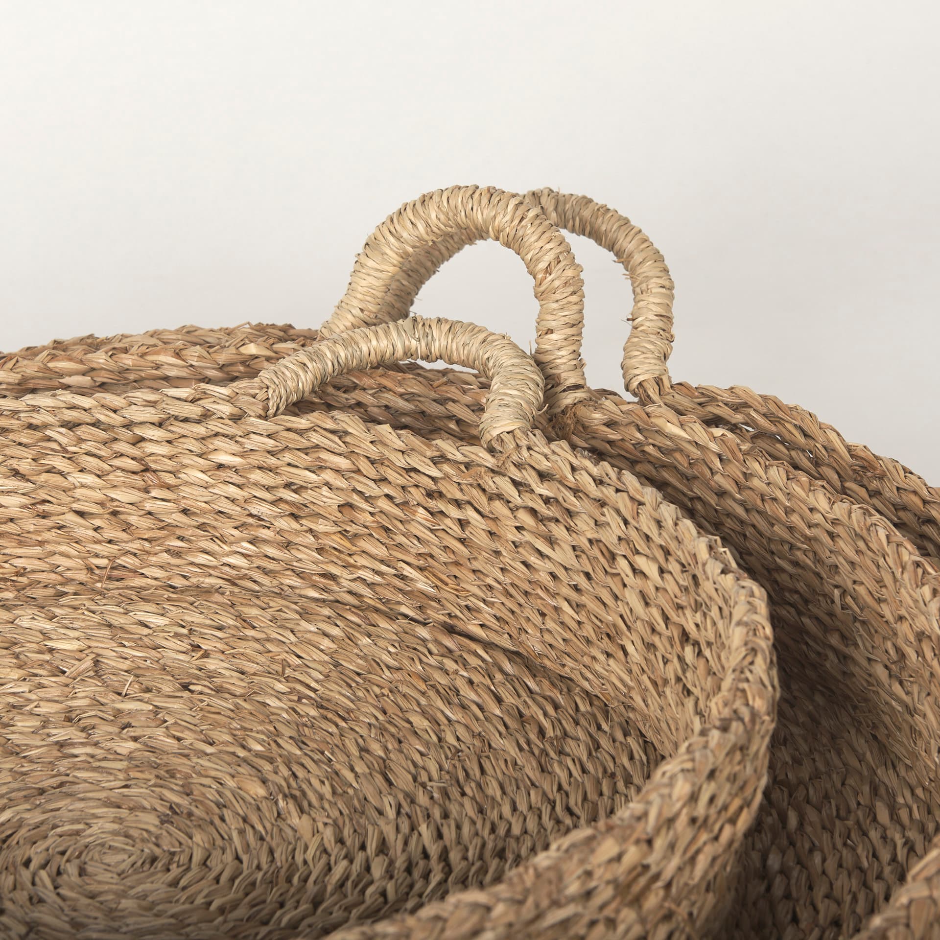 Ulana Set of 3 Round Nesting Seagrass Trays w/ Loop Handles — product photograph