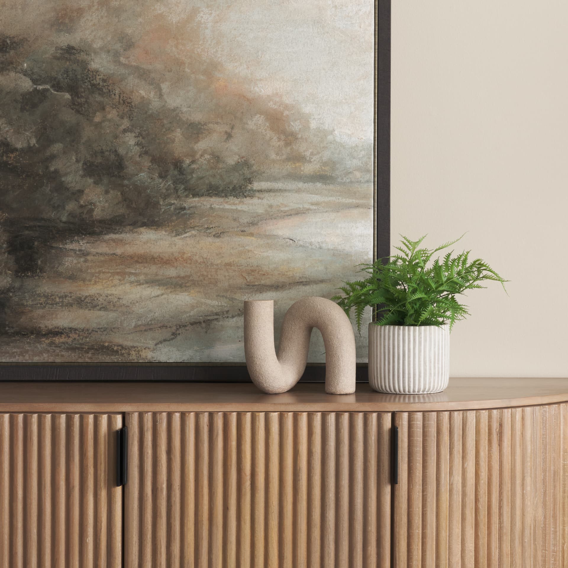 Kailas Resin Textured Sandstone Decorative Object — in a styled room