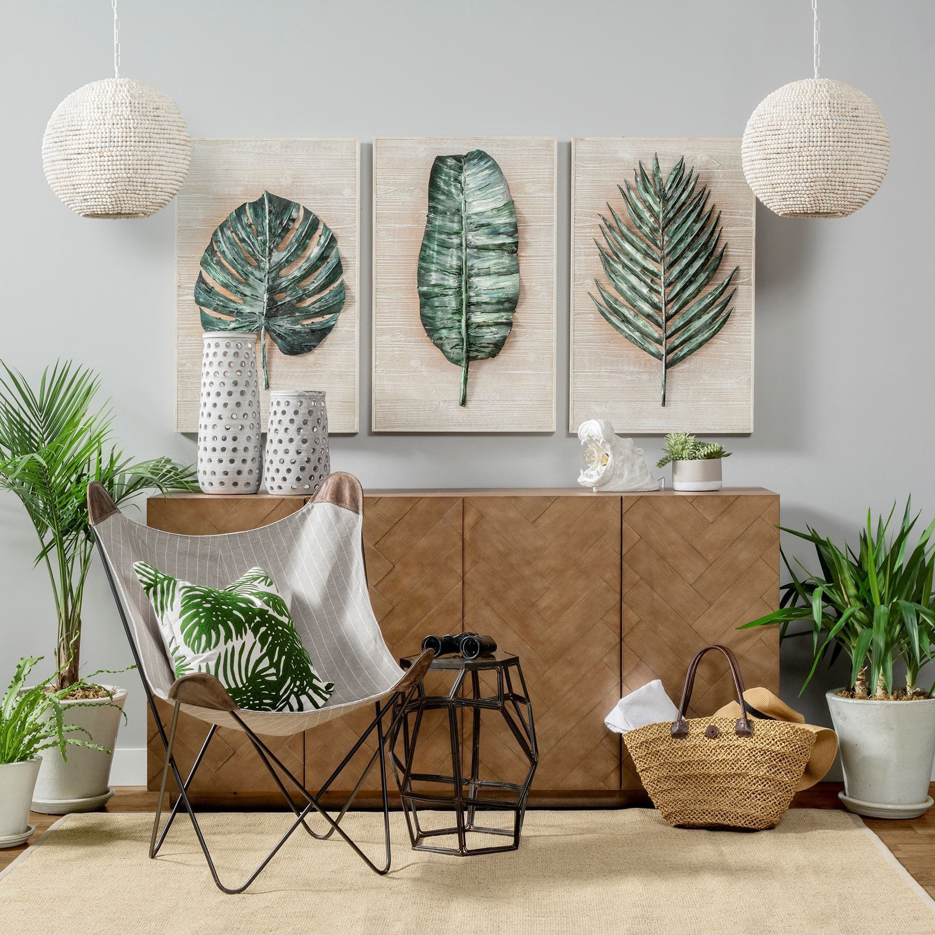 Boyle 20x20 Green Tropical Palm Leaf Pillow Cover — in a styled room