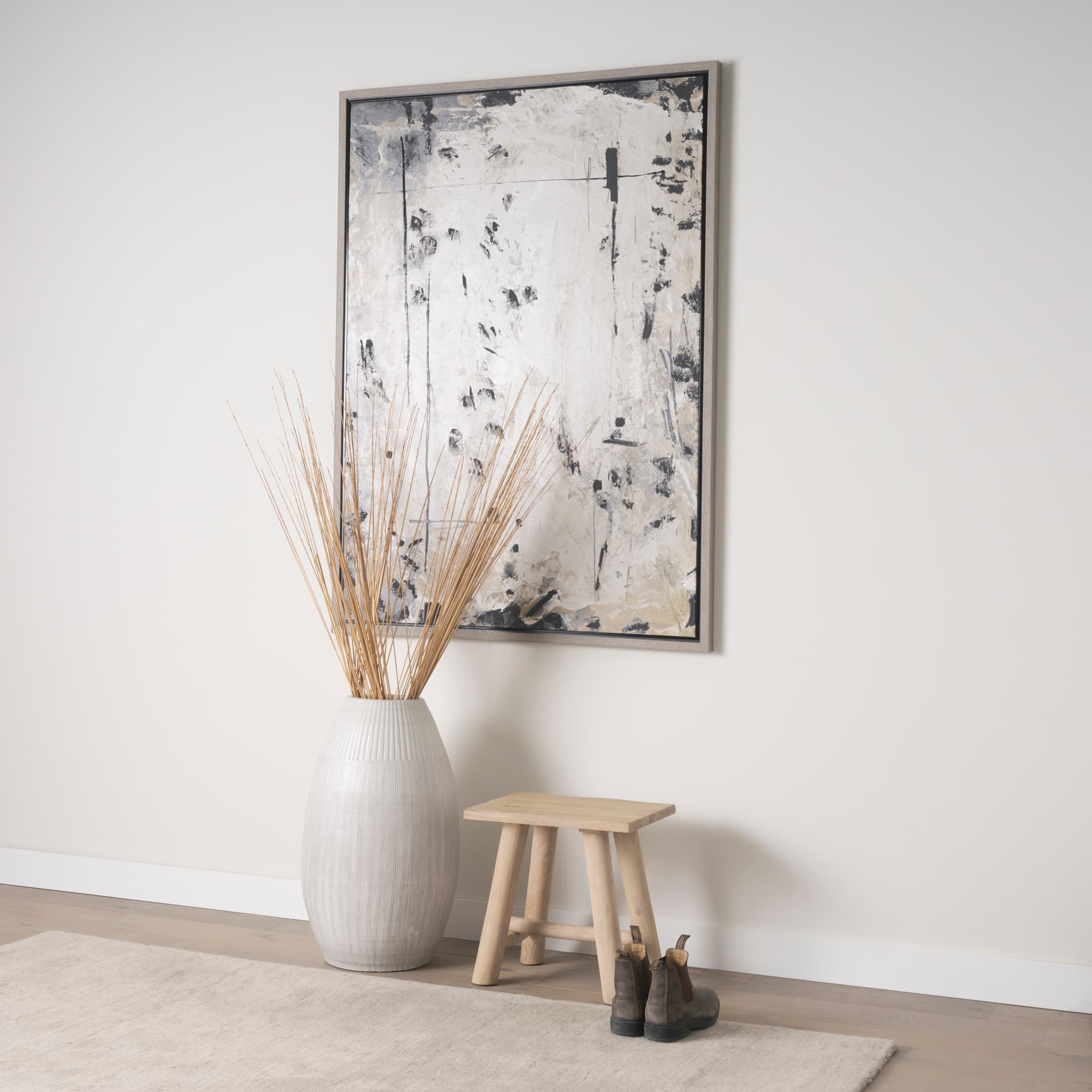 Sekou Light Brown Short Wooden Craftsman Stool — in a styled room