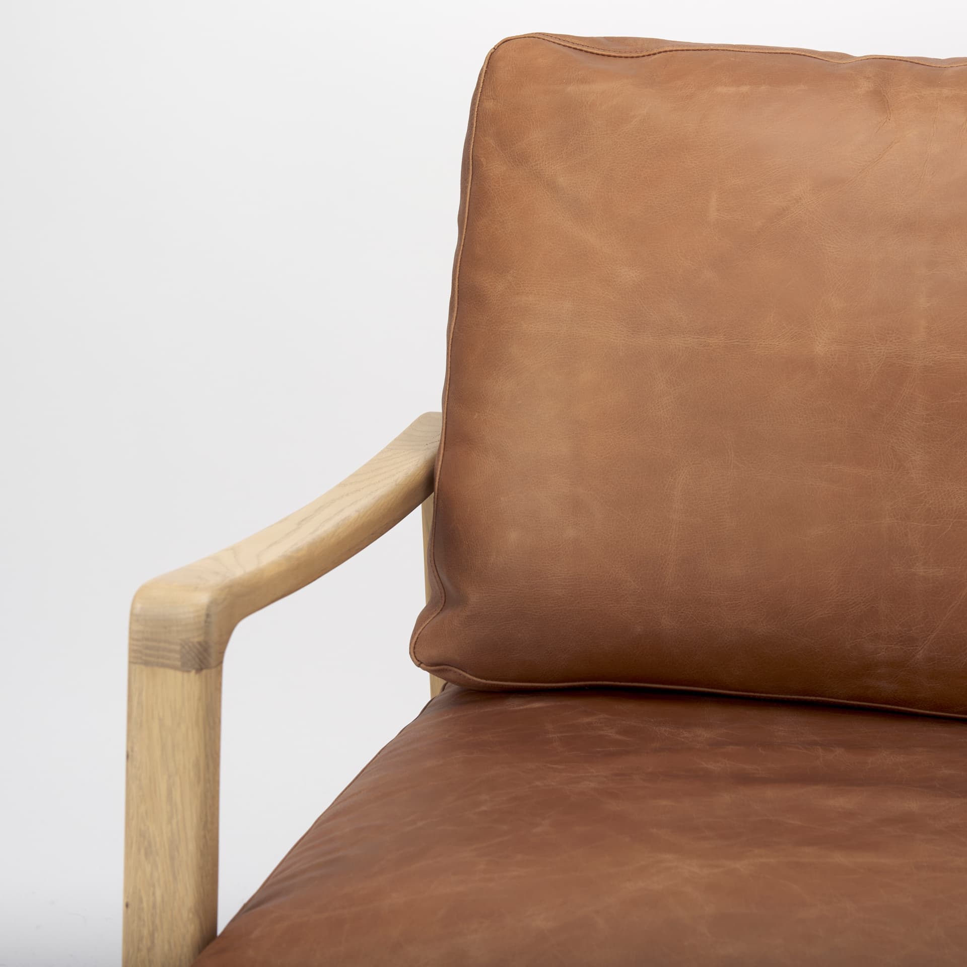 Raeleigh 28.0L x 34.1W x 34.4H Cognac Leather W/ Light Brown Wood Frame Accent Chair — product photograph