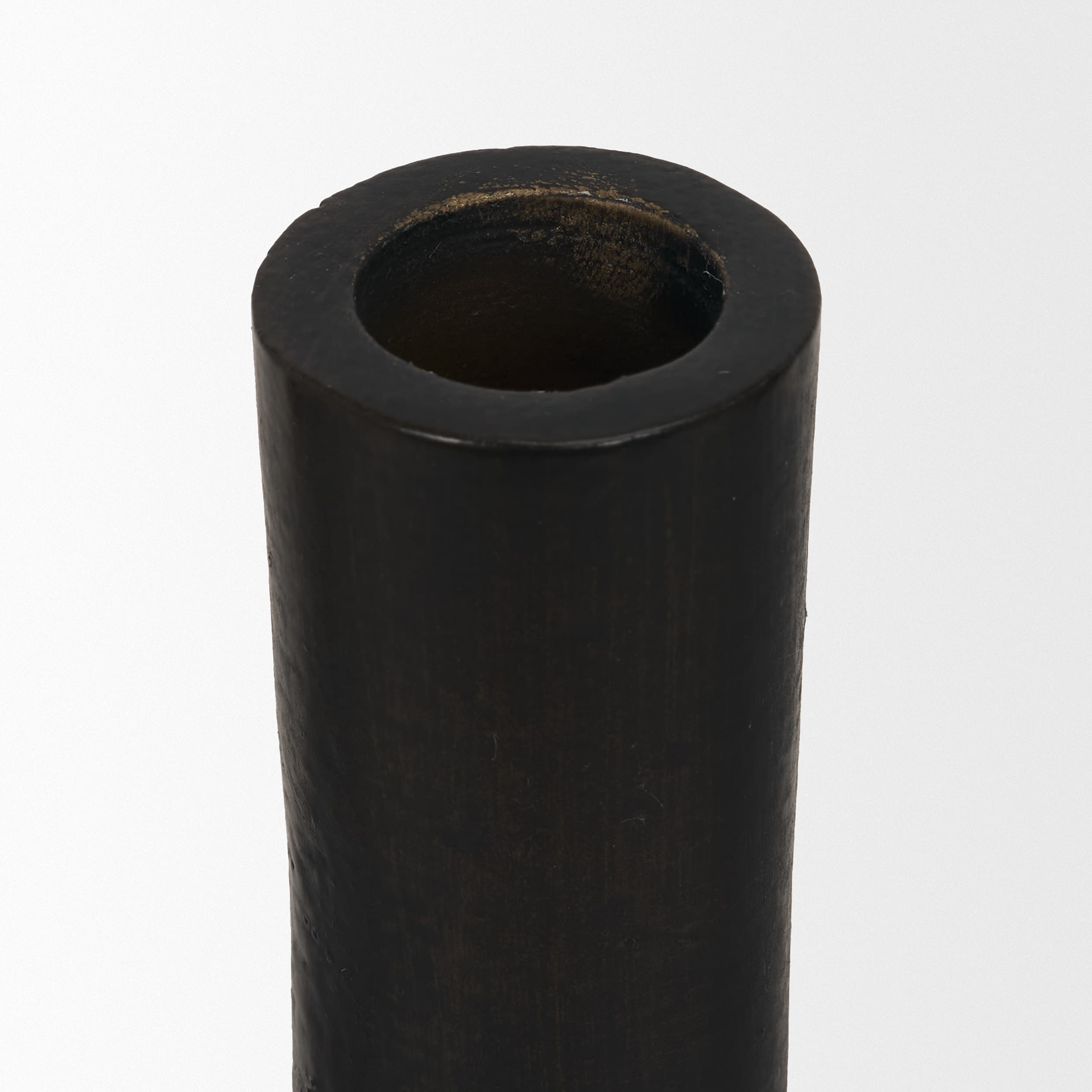 Declan Textured Matte Black Cast Metal Taper Candle Holder — product photograph