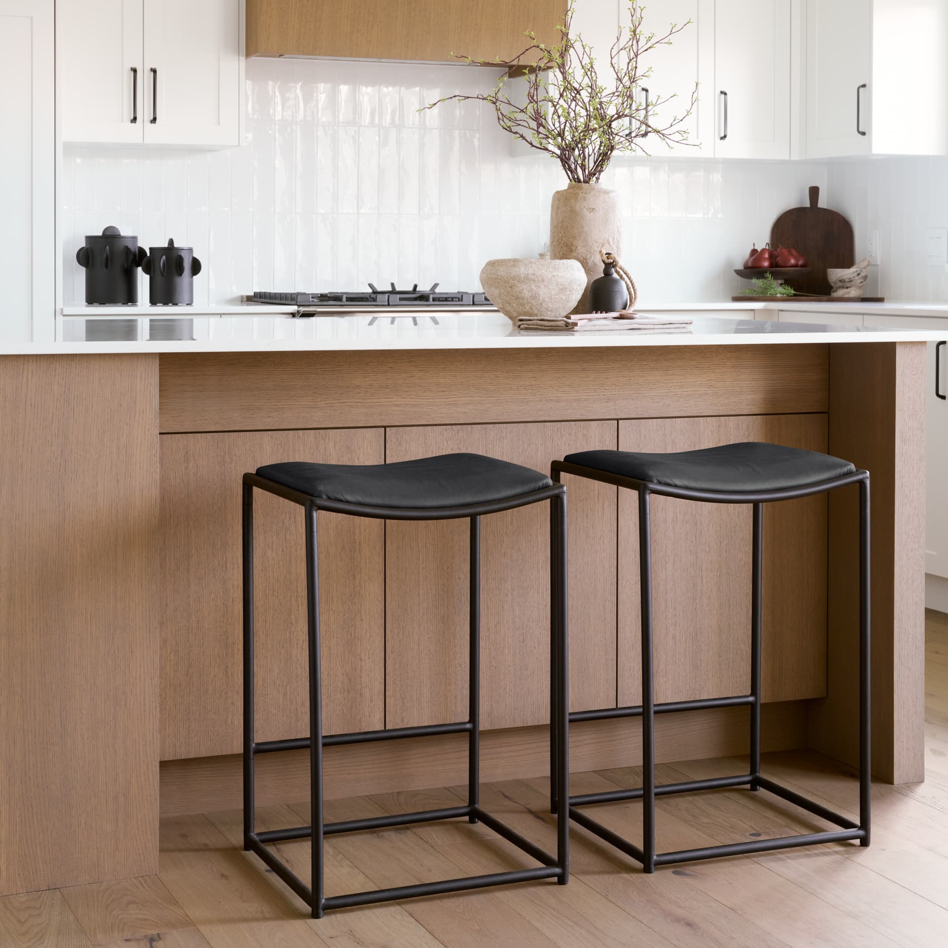 Taniel Backless 27.25in Seat Counter Stool | Black Leather w/ Metal — product photograph