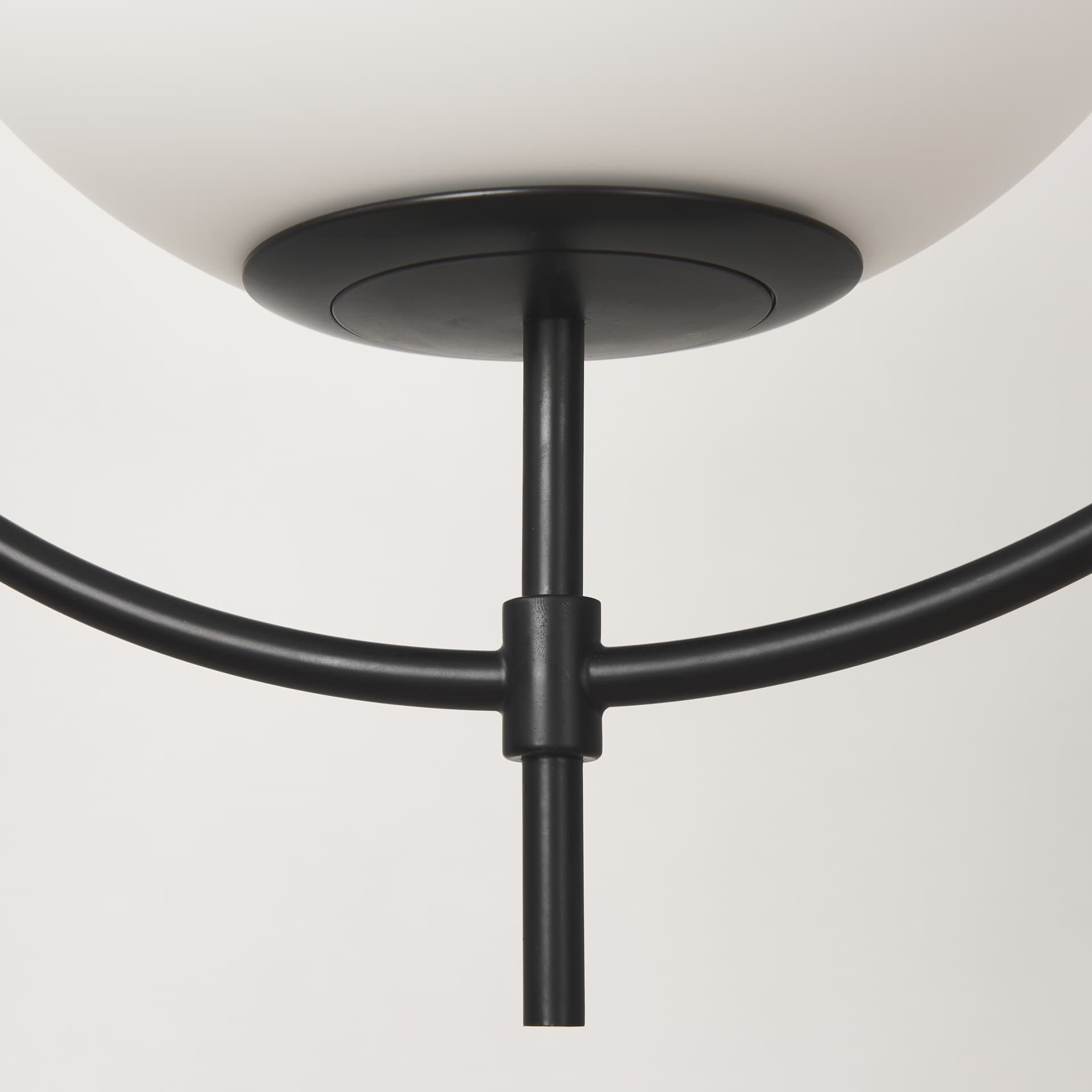 Farrah Frosted Glass Globe set in Matte Black Metal Pendant Ceiling Light — product photograph