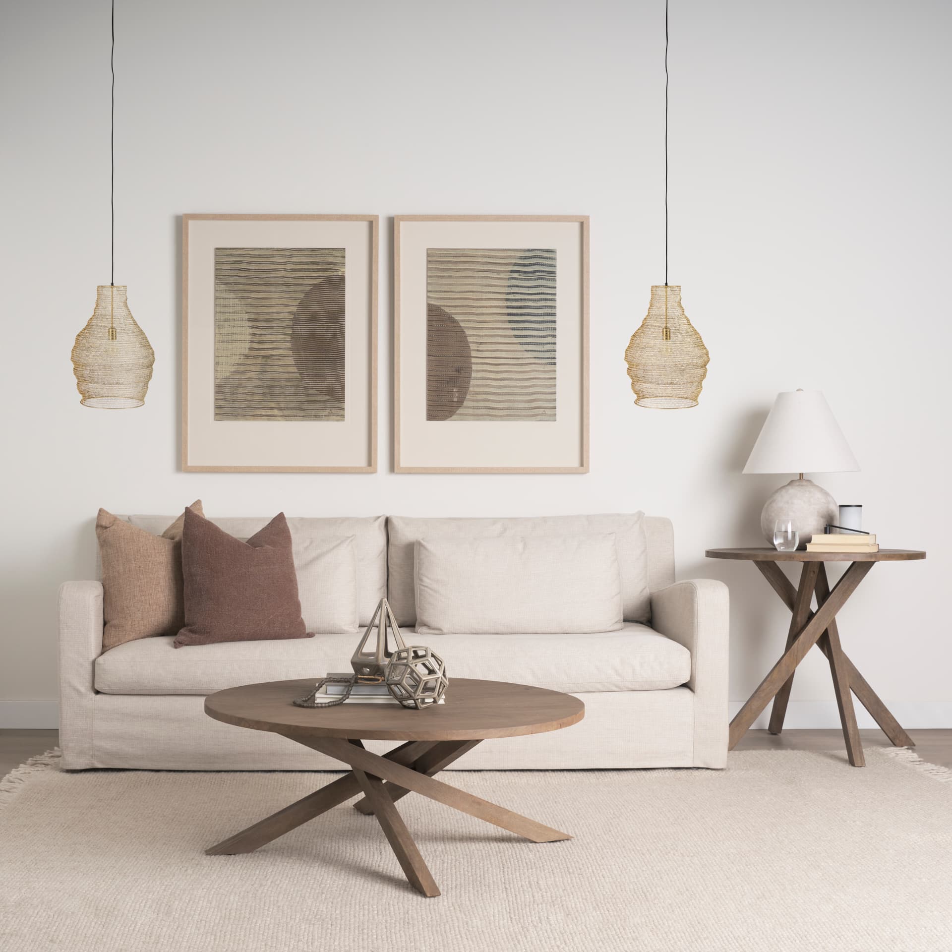 Halycon 16.0L x 16.0W x 20.0H Gold Mesh and Iron Pendant Light — in a styled room