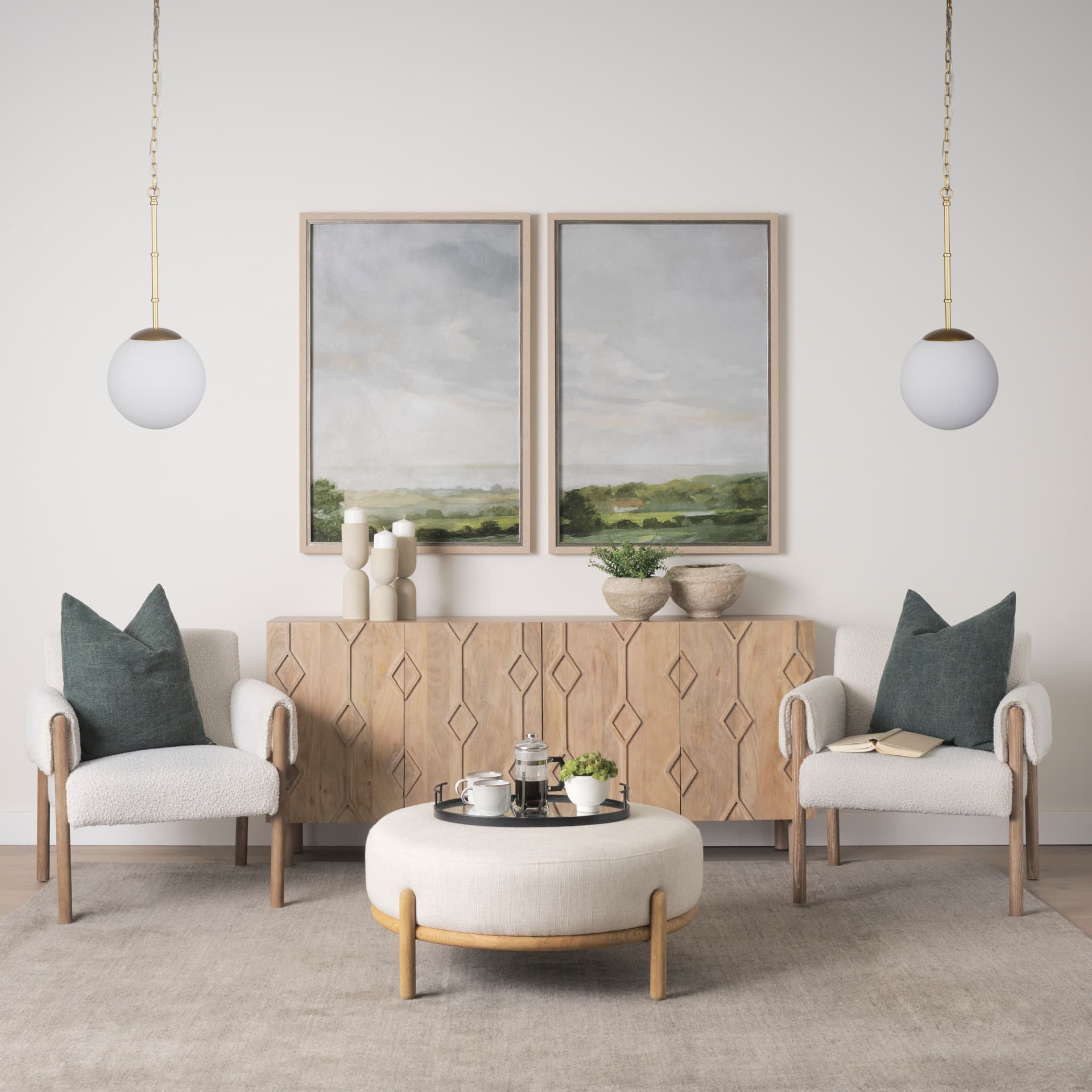 Edie Brushed Gold Metal w/ Frosted Glass Globe 1-Light Pendant — in a styled room