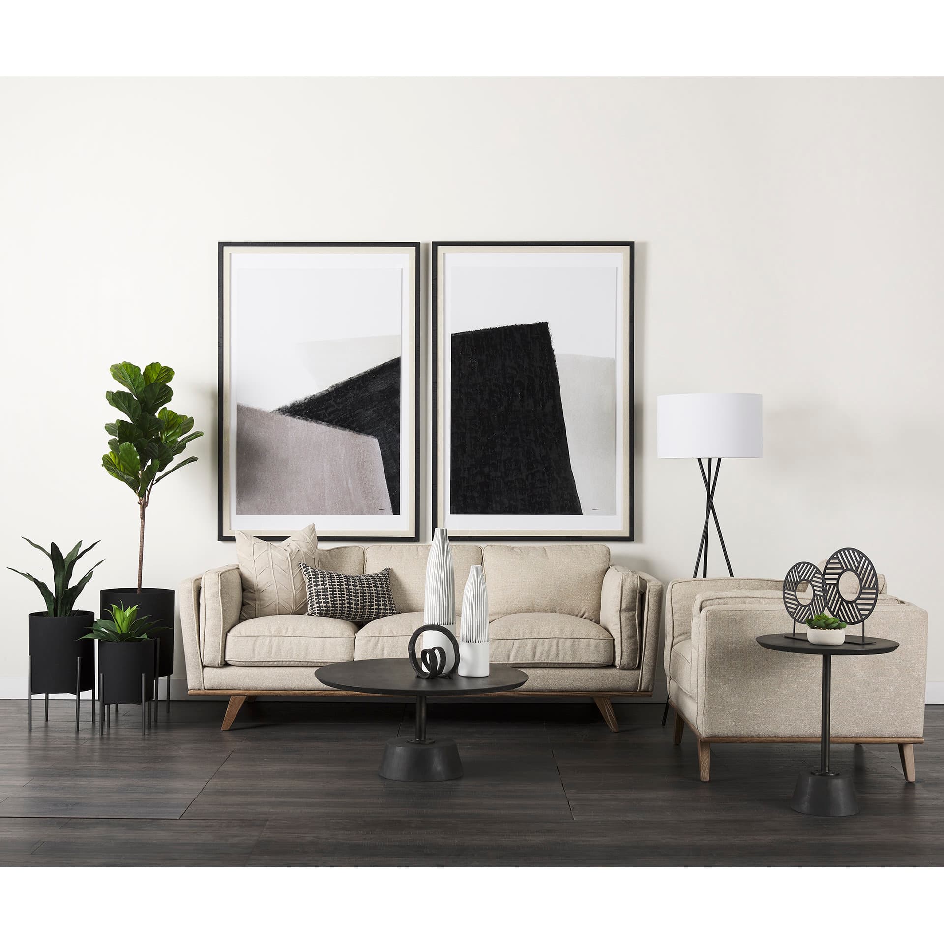 Micra 9.1L x 2.6W x 10.9H Matte Black Metal Decorative Object on a Stand — in a styled room