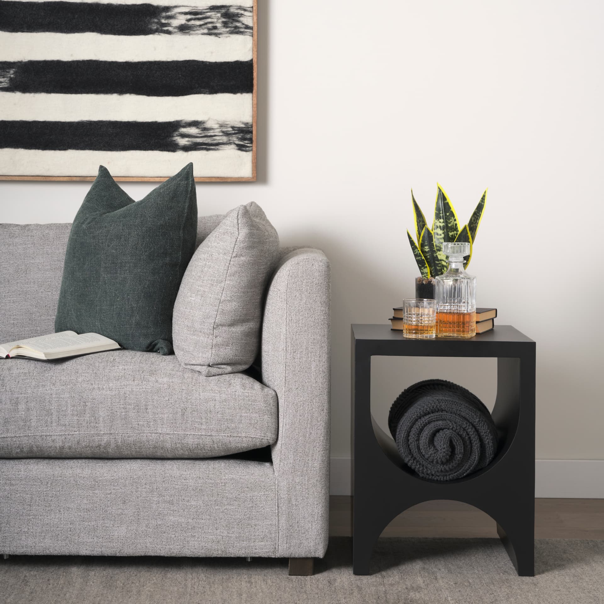 Sobi Matte Black Square Metal Side Table — in a styled room