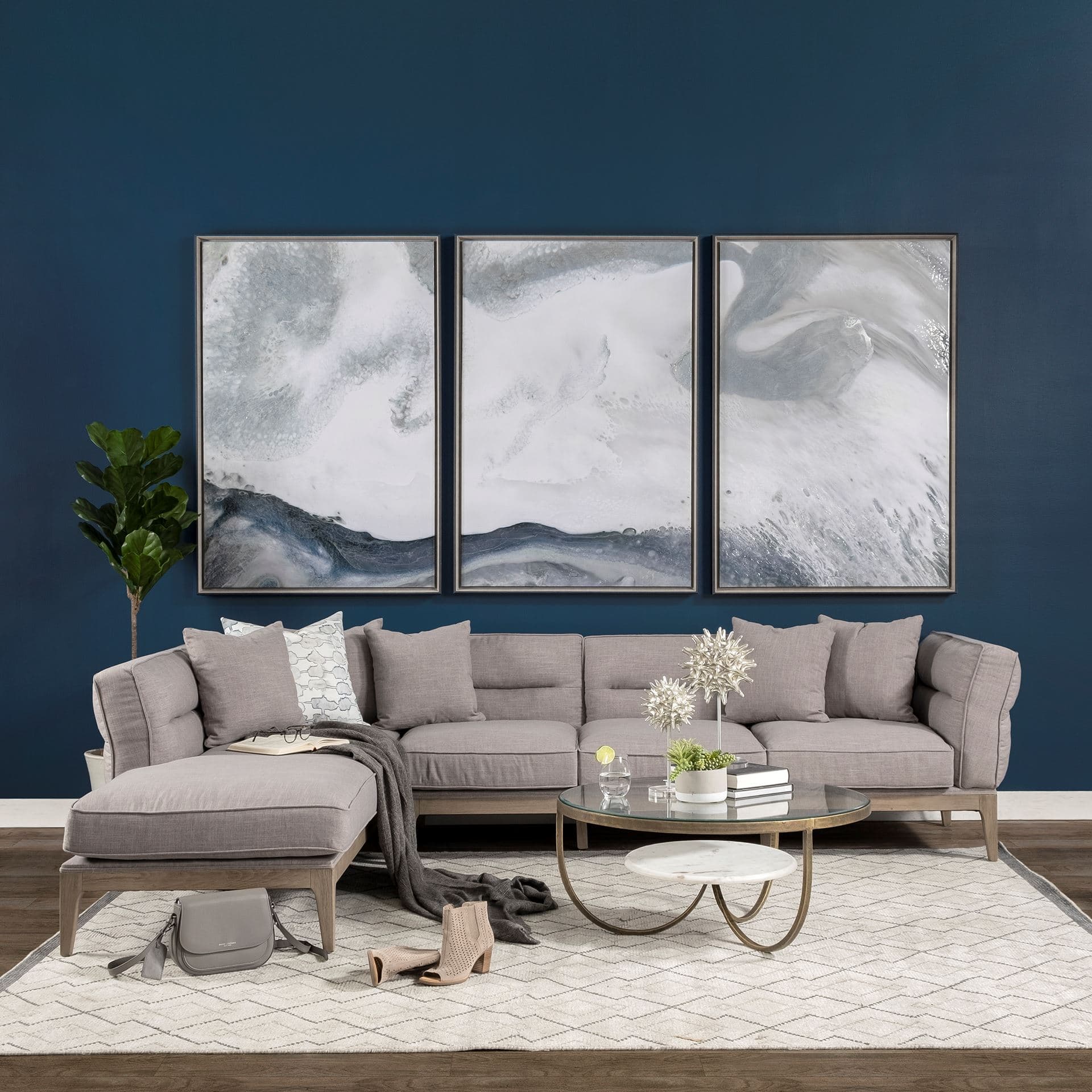 Reinhardt 36" Round Glass Top Marble Shelf Gold Metal Base Coffee Table — in a styled room