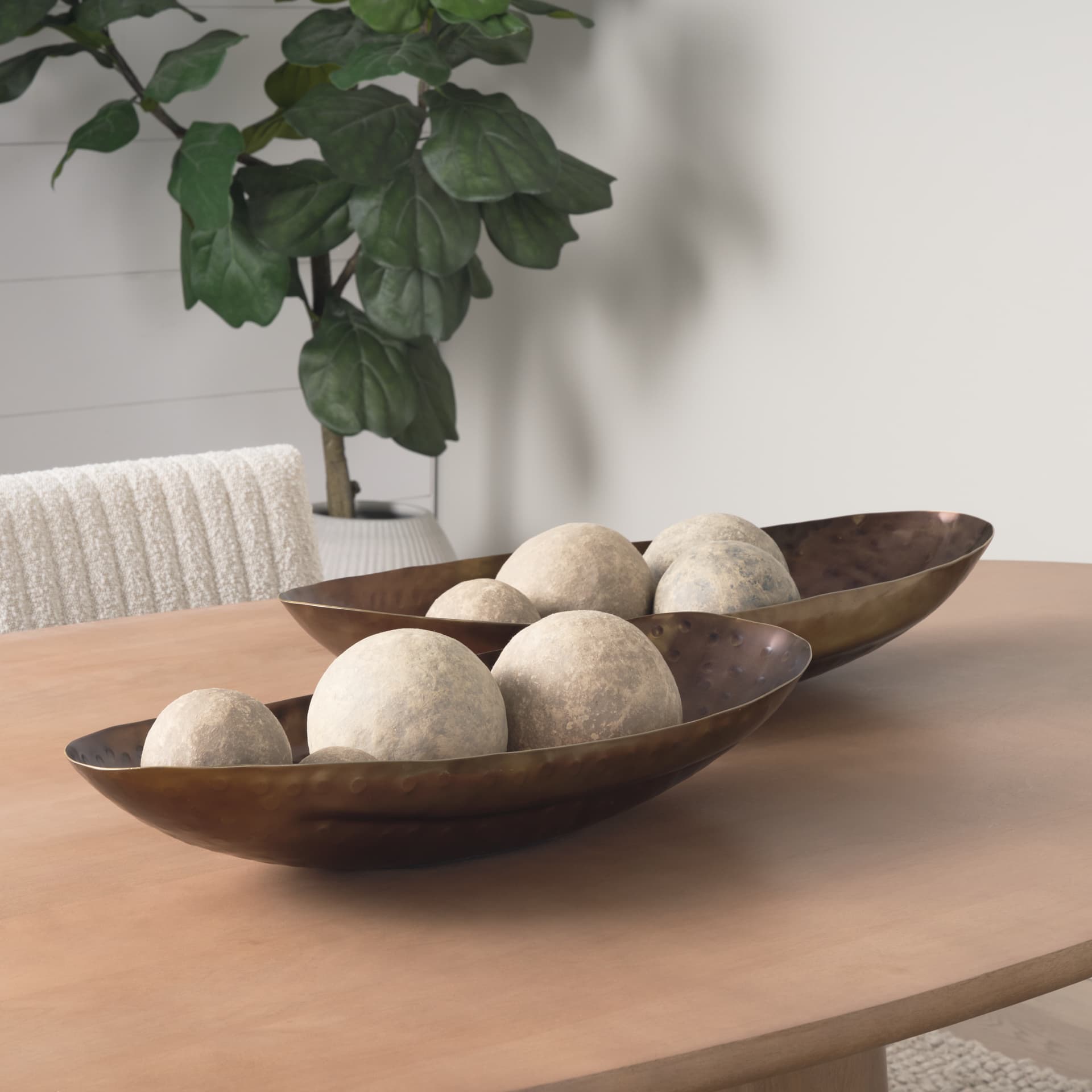 Karmen (Set of 2) Gold Hammered Oversized Bowls — in a styled room