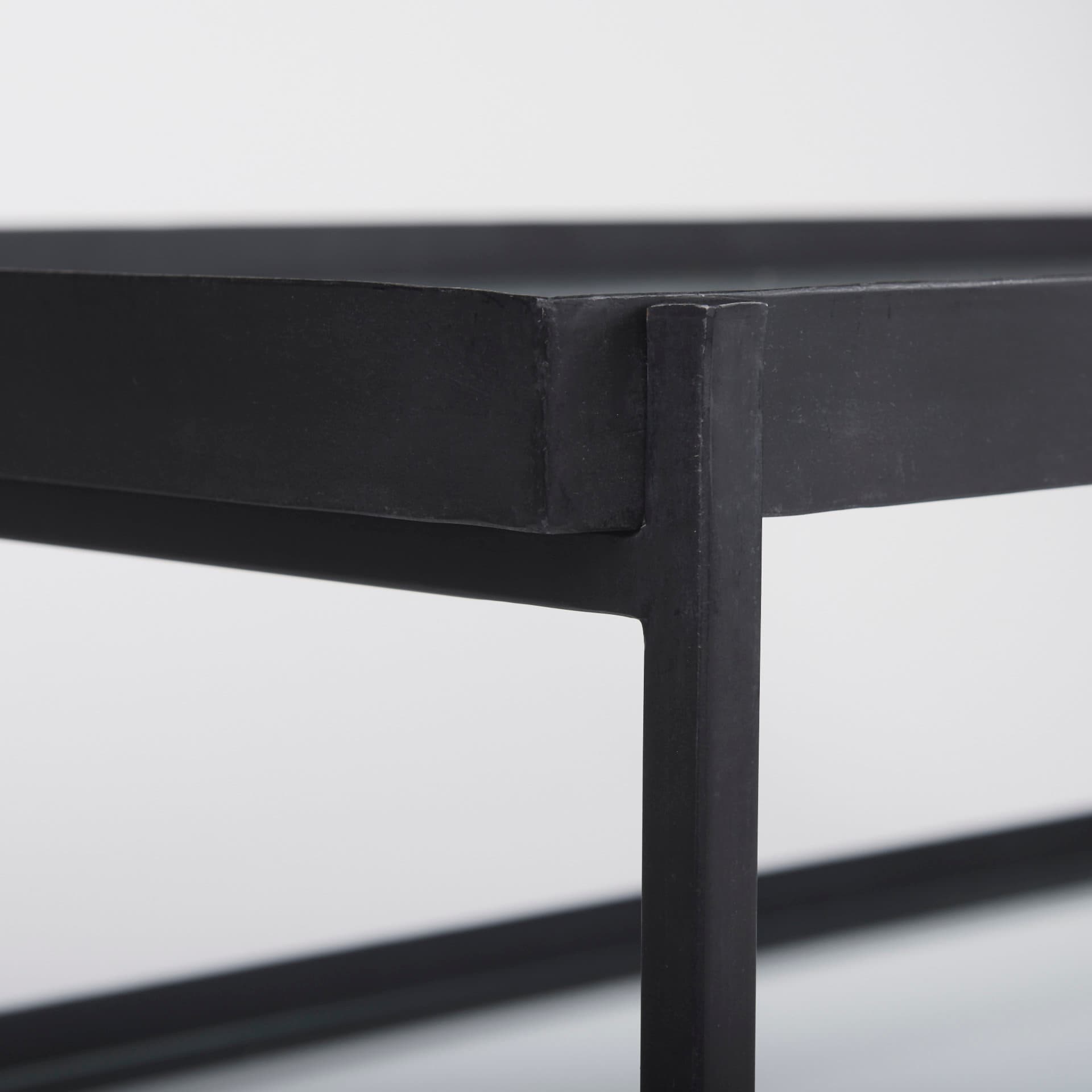 Trey 56"L x 32"W x 17"H Black Metal W/Glass Coffee Table — product photograph