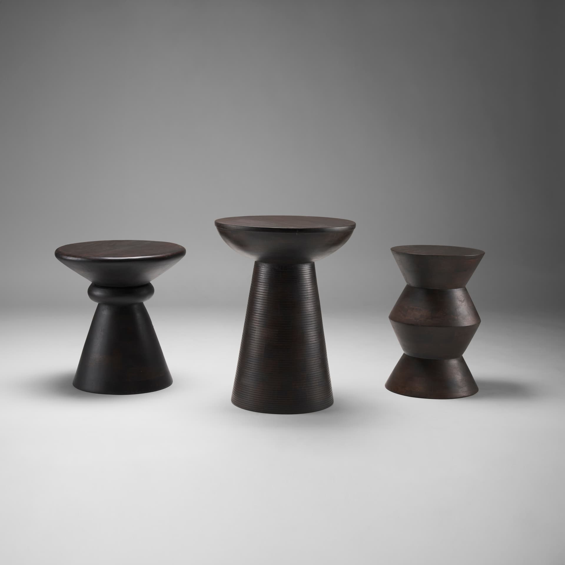 Palmera Dark Brown Wood Pedestal Accent Table — product photograph