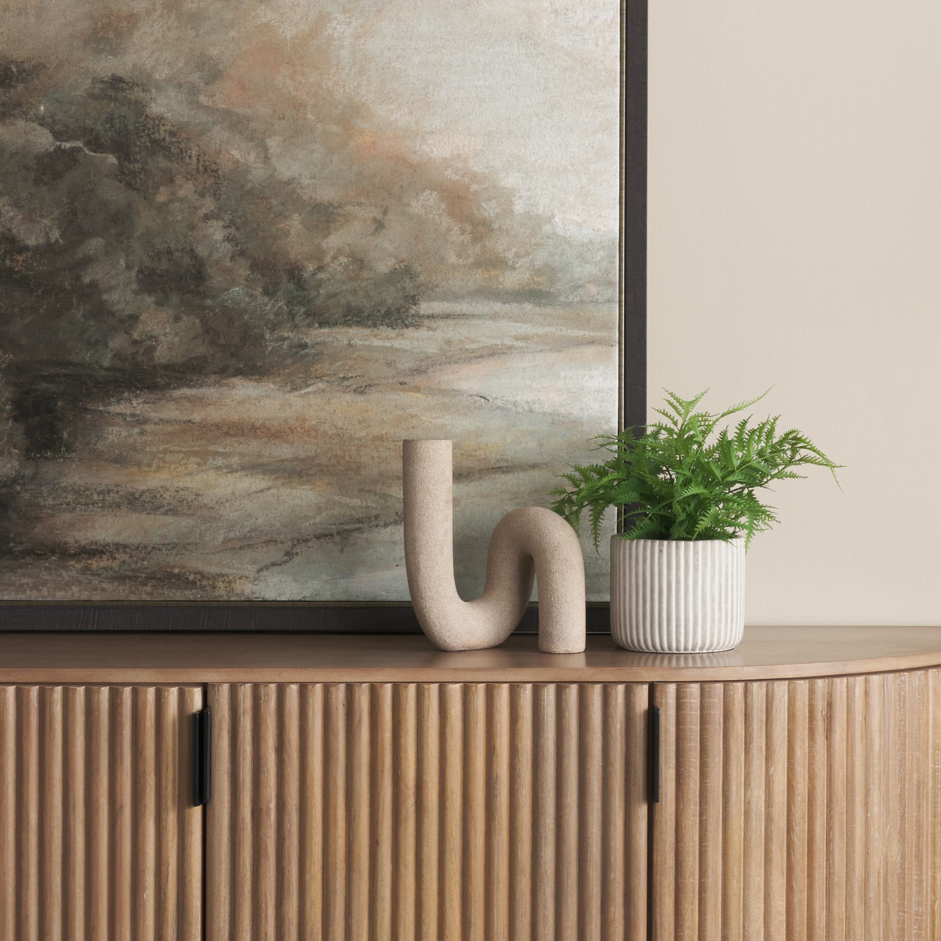 Kailyn Resin Textured Concrete Gray Decorative Object — in a styled room