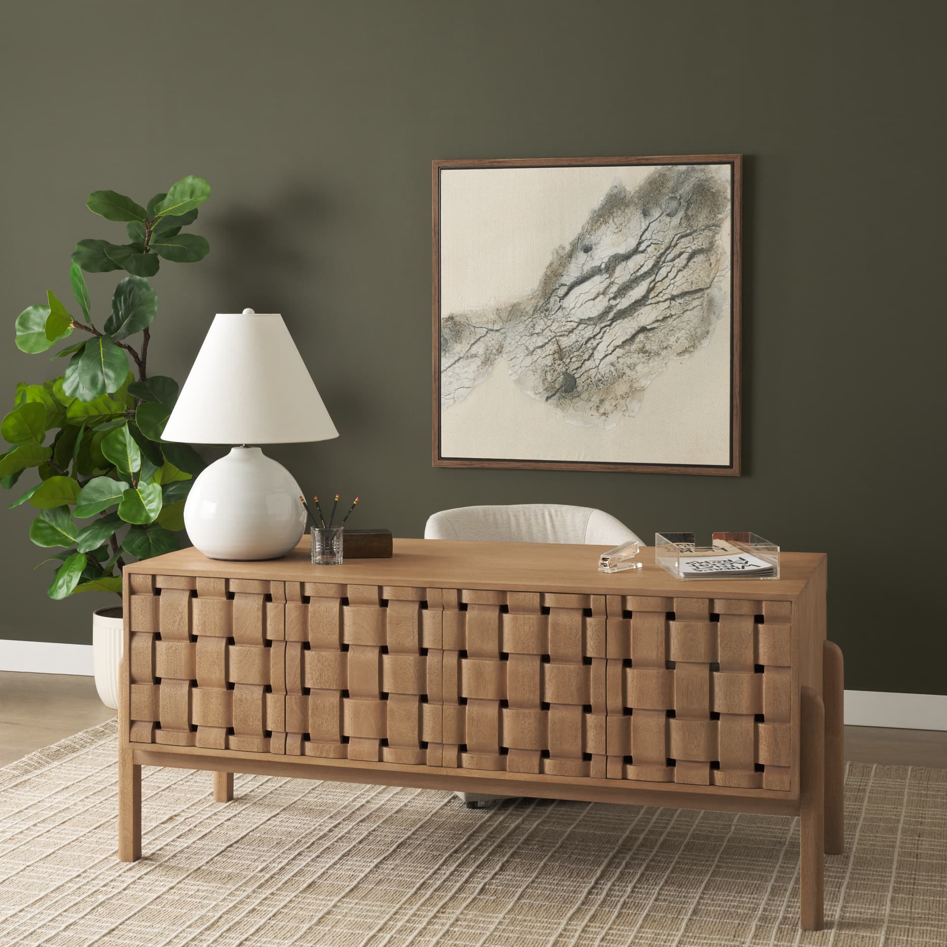 Trellyn Light Brown Solid Wood Carved Woven Desk — in a styled room