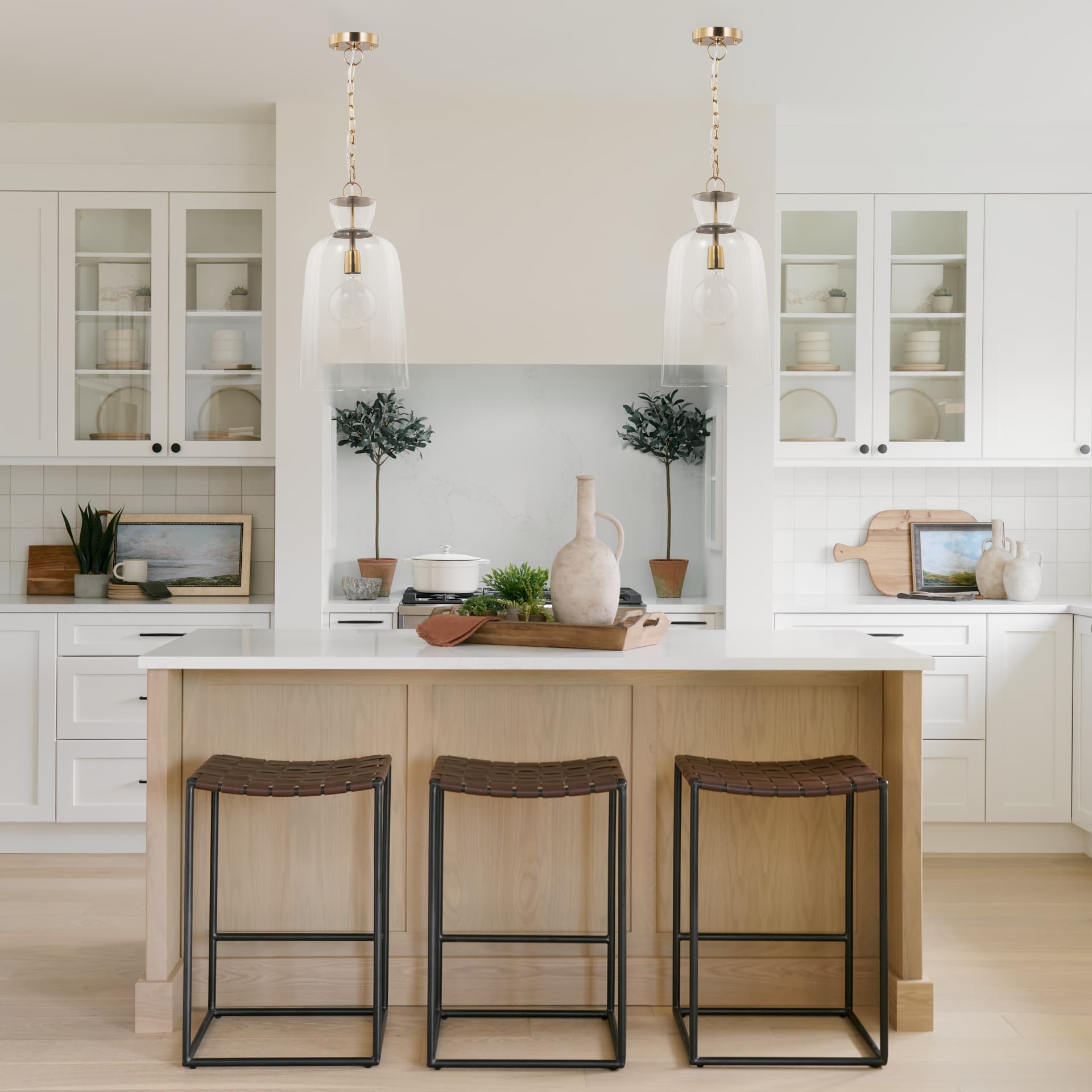 Sadah Tall Clear Blown Glass w/ Gold Metal Pendant Light — in a styled room