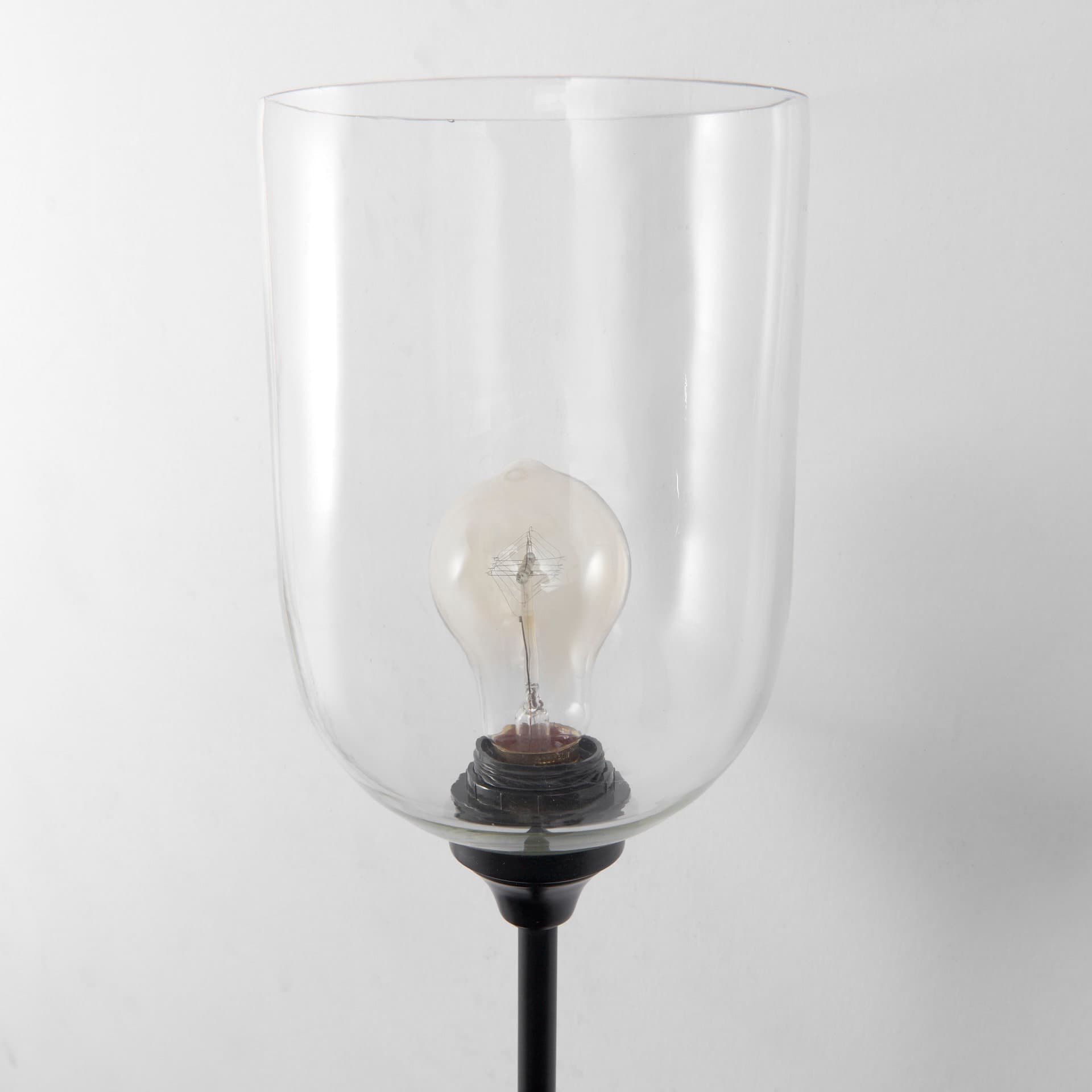 Clyde 6.0L x 8.0W x 37.0H Matte Black W/Glass Round Wall Sconce — product photograph