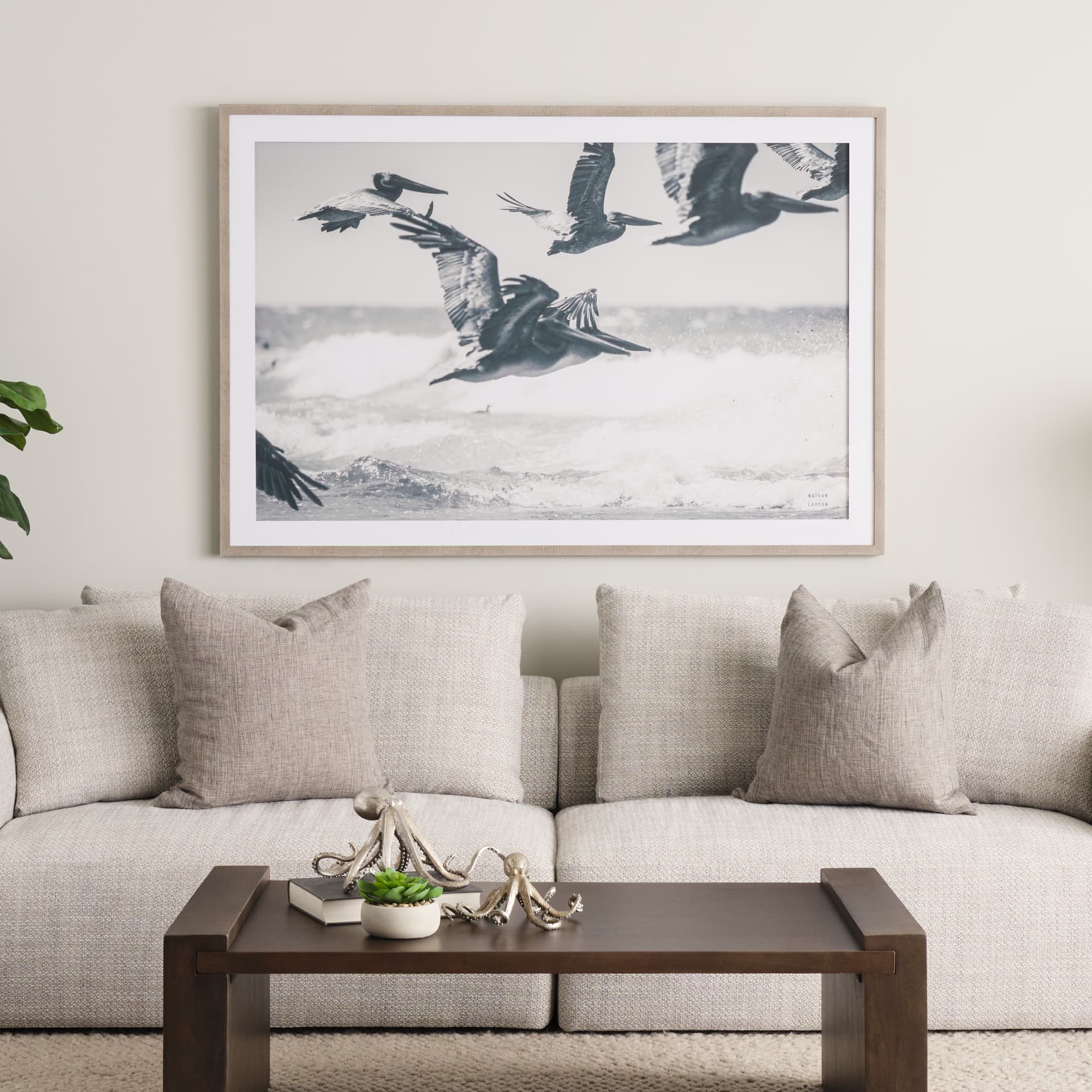 Pelican Beach by Nathan Larson a Hand Embellished Framed Photo Art Print Matted under Glass — in a styled room