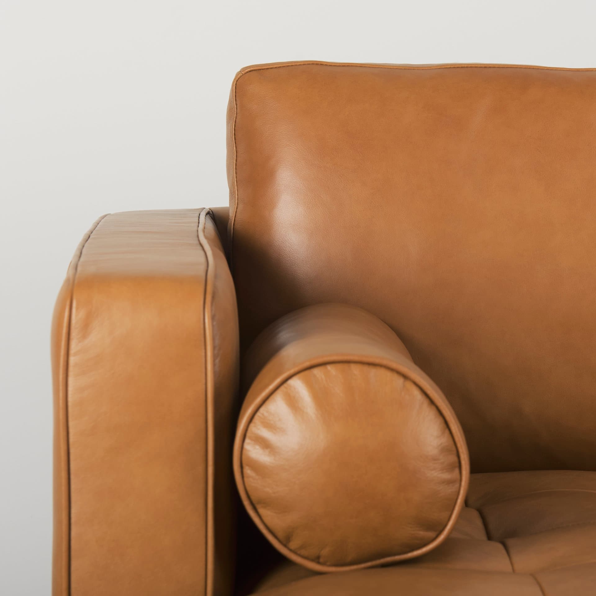 Svend 111.4L x 68.0W x 33.9H Tan Leather Left Chaise Sectional Sofa — product photograph