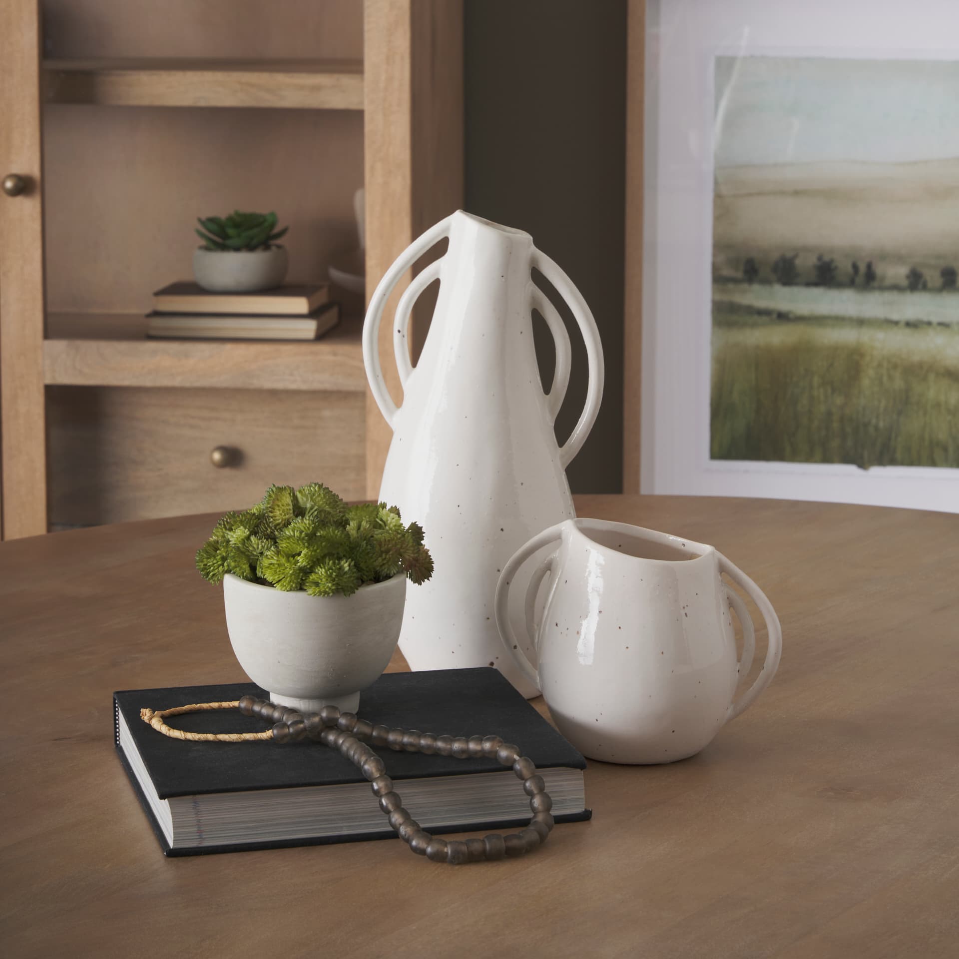 Urvi Short Off White Speckled Asymmetrical Ceramic Vase — in a styled room