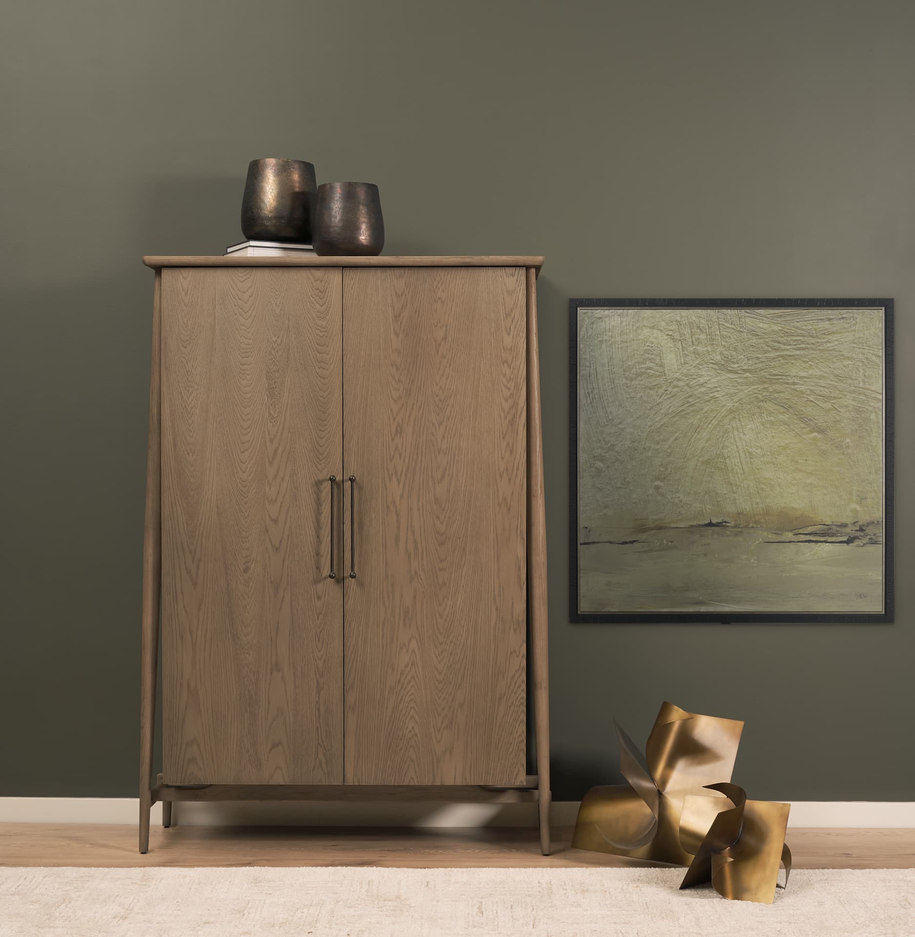 Hollis Gray-Brown Wood Curio Cabinet — in a styled room