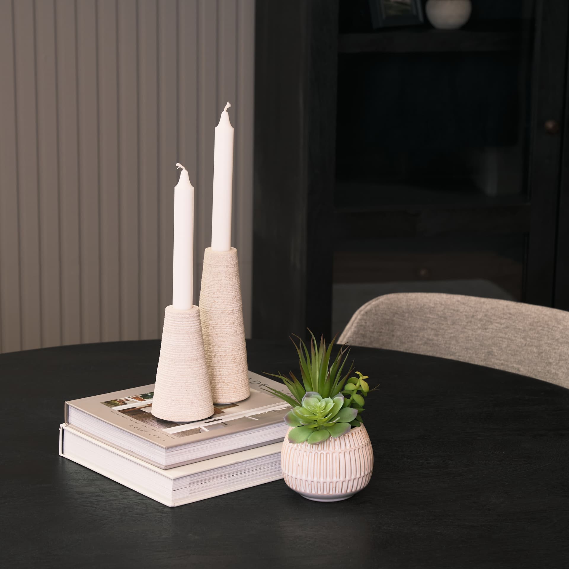 Cono Off-White Marble Cone Shaped Candle Holders (Set of 2) — in a styled room