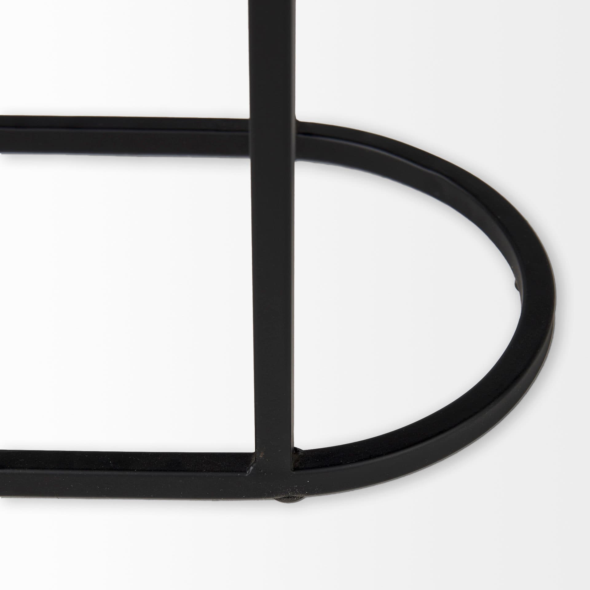 Celine 24.2 L x 12.6 W x 22.4 H Set of Two Black/Silver Metal and Glass Nesting Accent Tables — product photograph