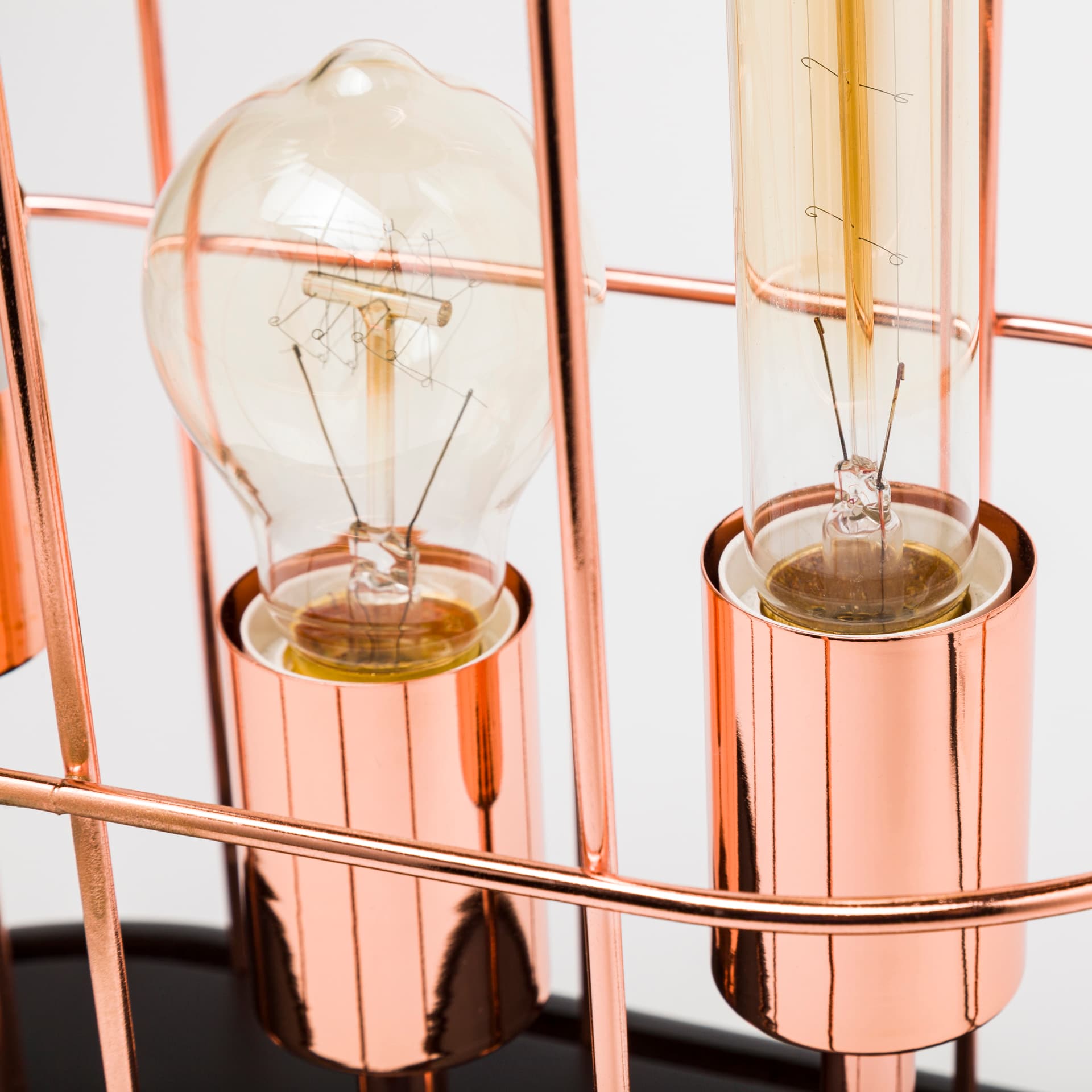 Sutton (19.3"H) Rose-Gold Metal Cylindrical Cage Three Bulb Table Lamp — product photograph