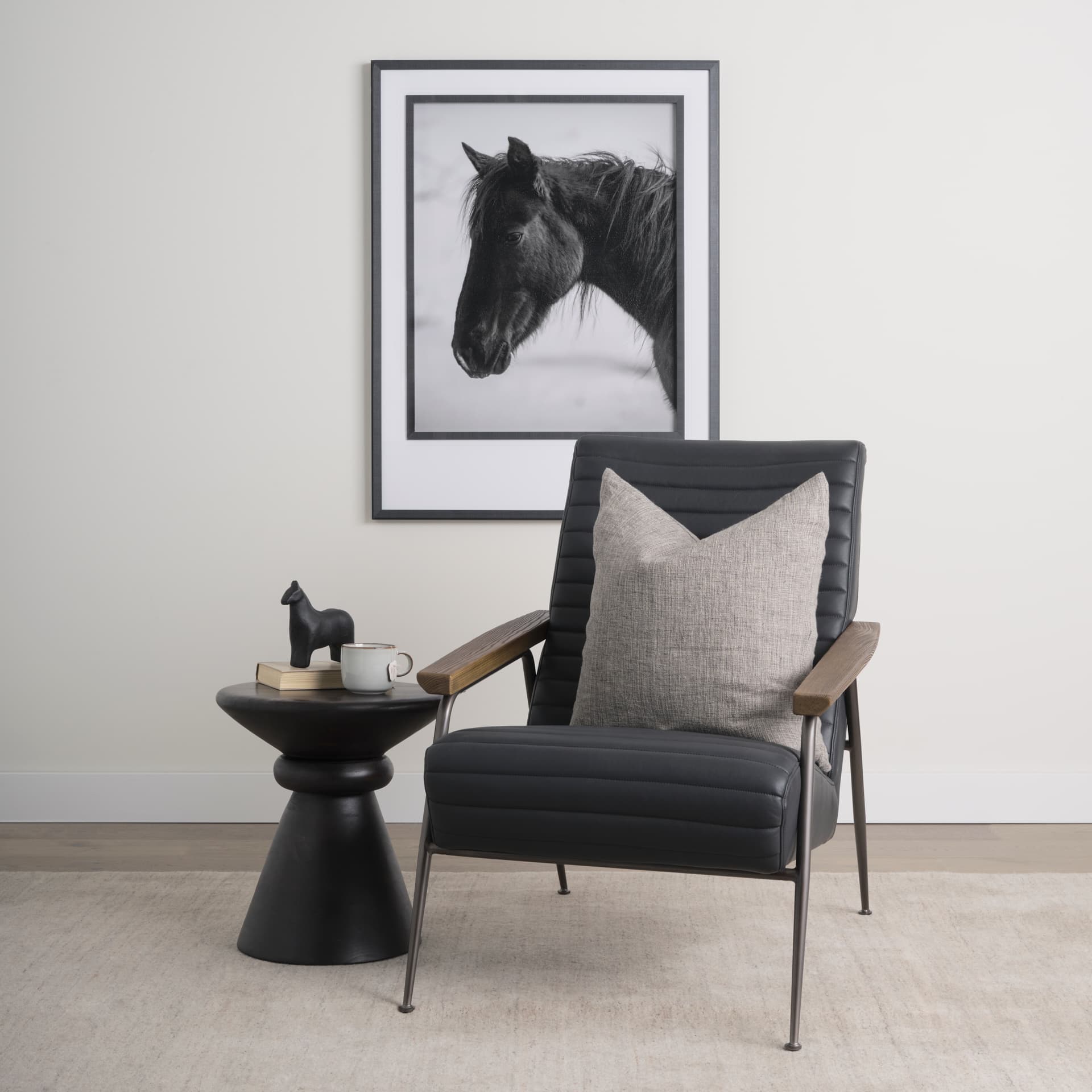 Grosjean Black Leather w/ Black Metal Frame Accent Chair — in a styled room