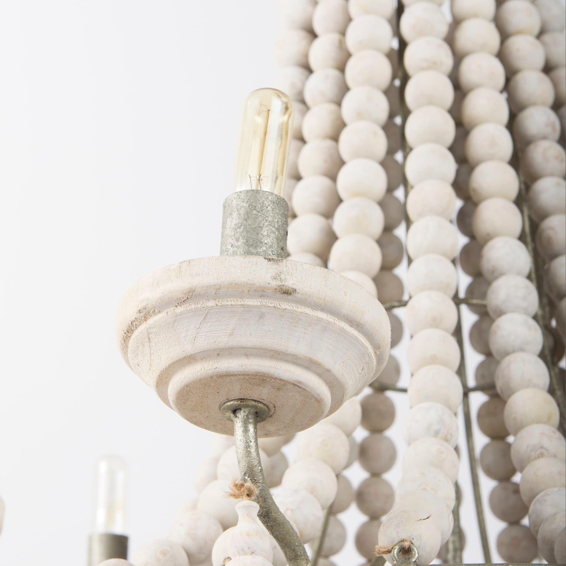 Phillum (29"x37") Silver Metal Chassis and White Wood Beaded Six Bulb Chandelier — product photograph