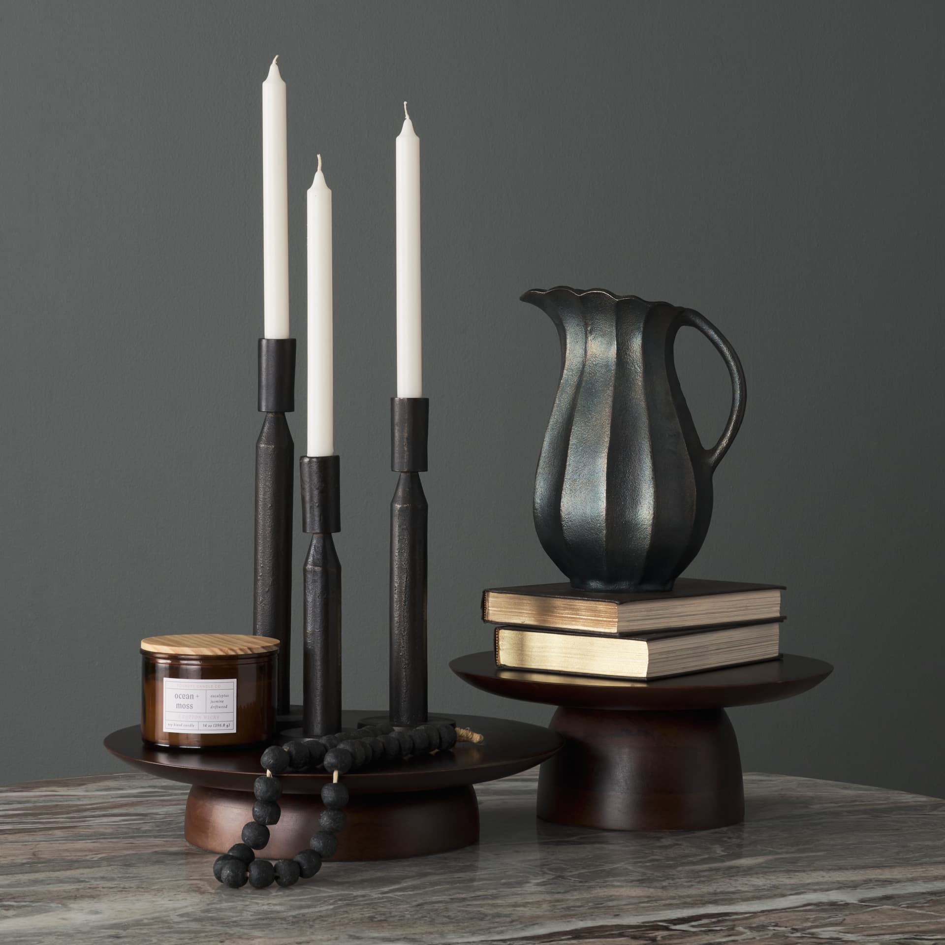 Declan Textured Matte Black Cast Metal Taper Candle Holder — product photograph
