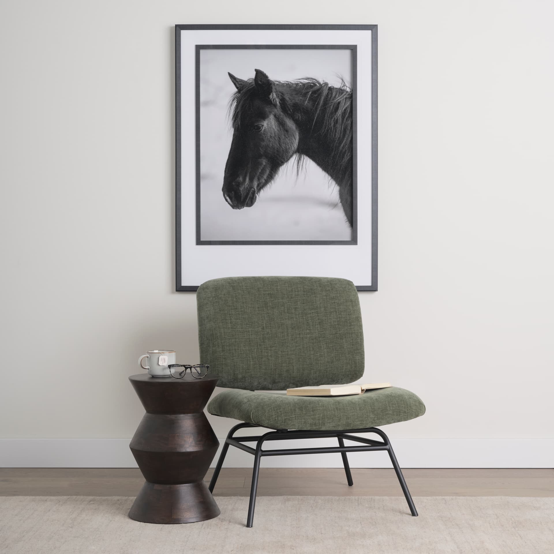 Nora Forest Green Fabric w/ Matte Black Metal Legs Accent Chair — in a styled room