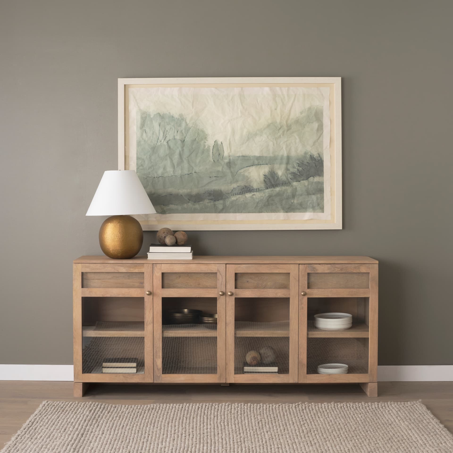 Suri Light Brown Wood w/ Glass Doors Sideboard — in a styled room