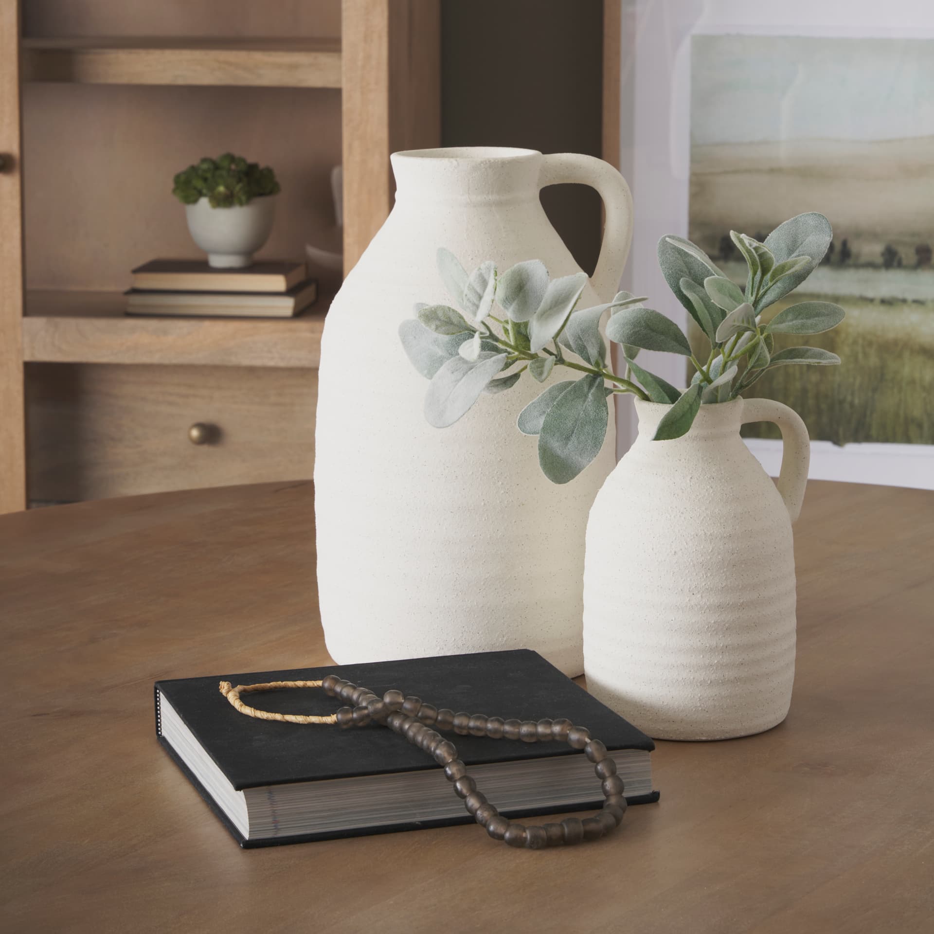 Tyrus Medium Textured Matte White w/ Speckling Ceramic Vase — in a styled room
